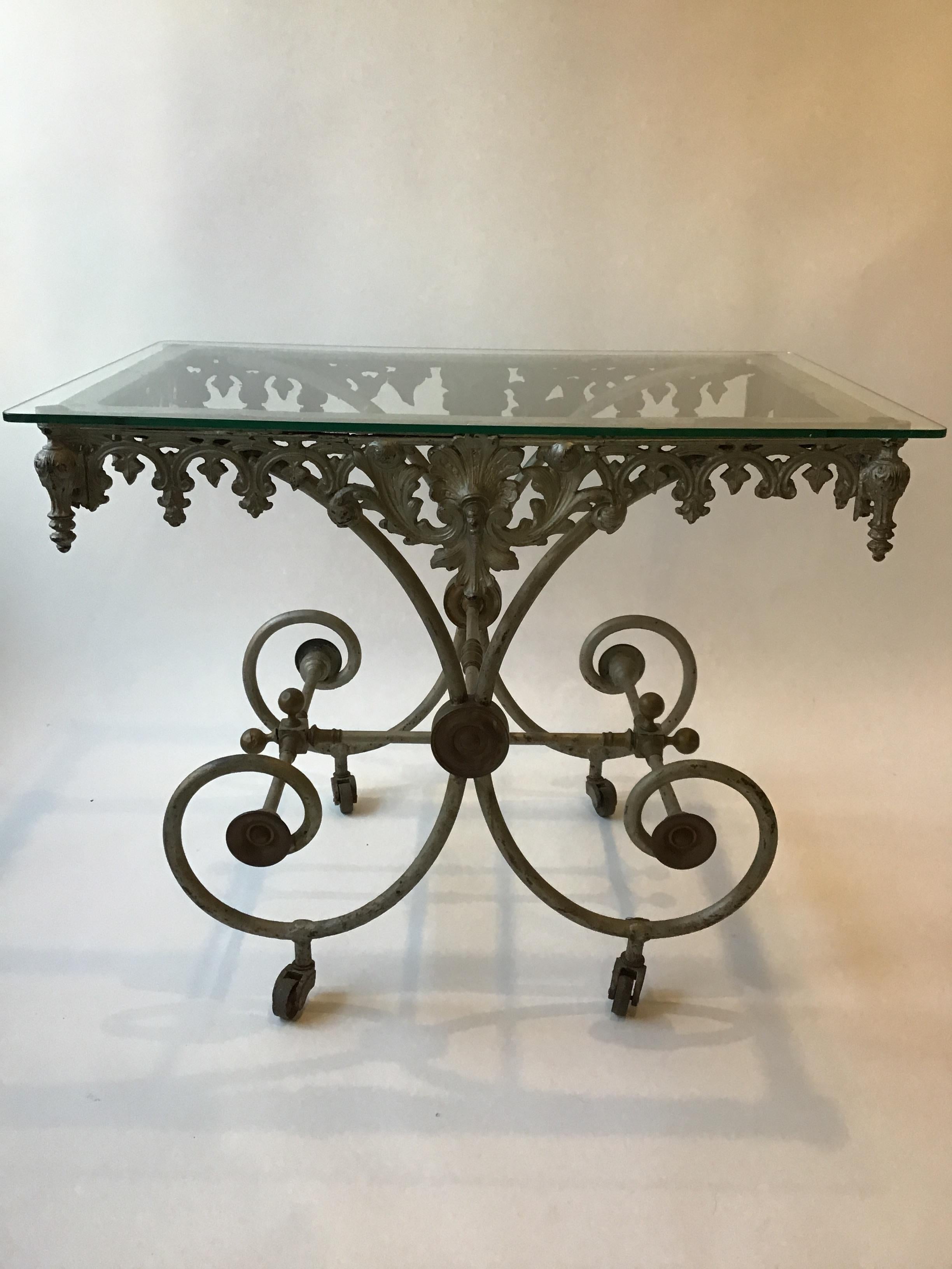 1880s French bakers table. Painted silver, iron with brass accents.