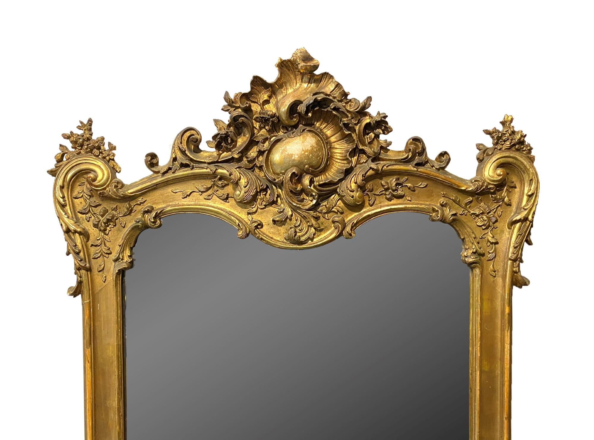 Late 19th Century 1880s French Beveled Glass Gilt Mirror Gesso and Hand Carved Wood