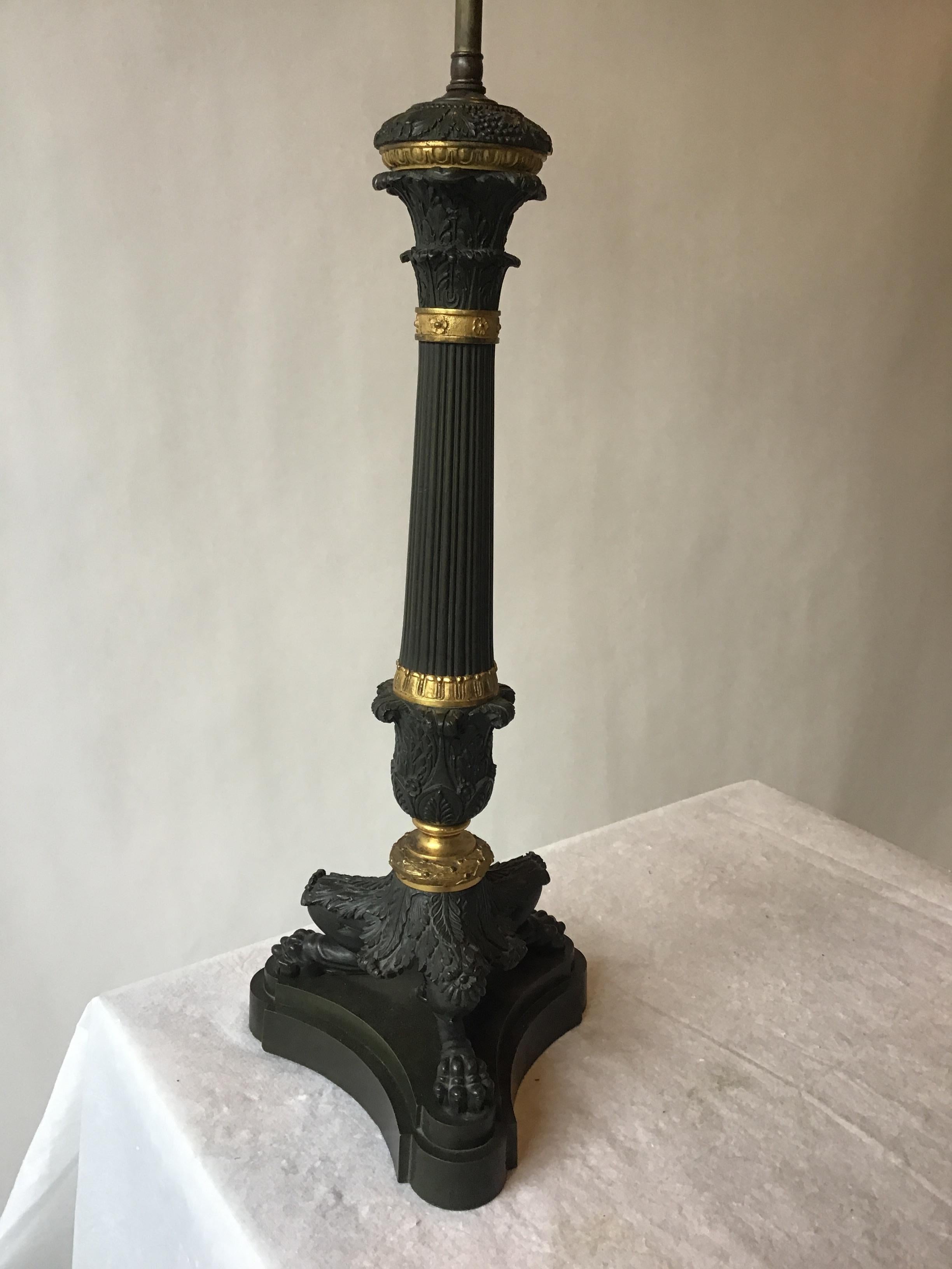 1880s French bronze Empire candlestick lamp.