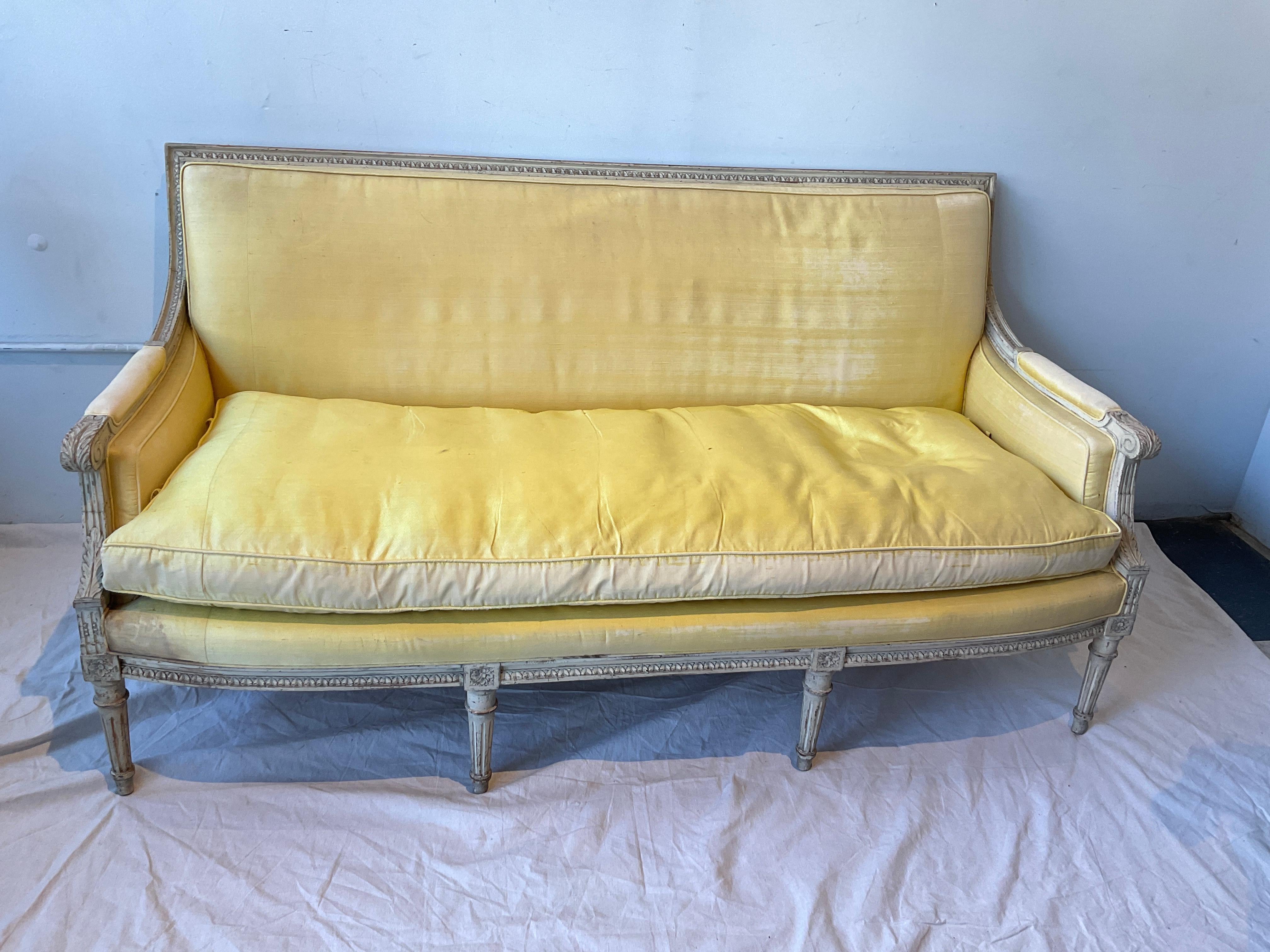 1880s French Louis XVI carved wood couch in a painted finish. From Yale R. Barge Antique shop of New York City.
Down cushion,  Needs reupholstering.