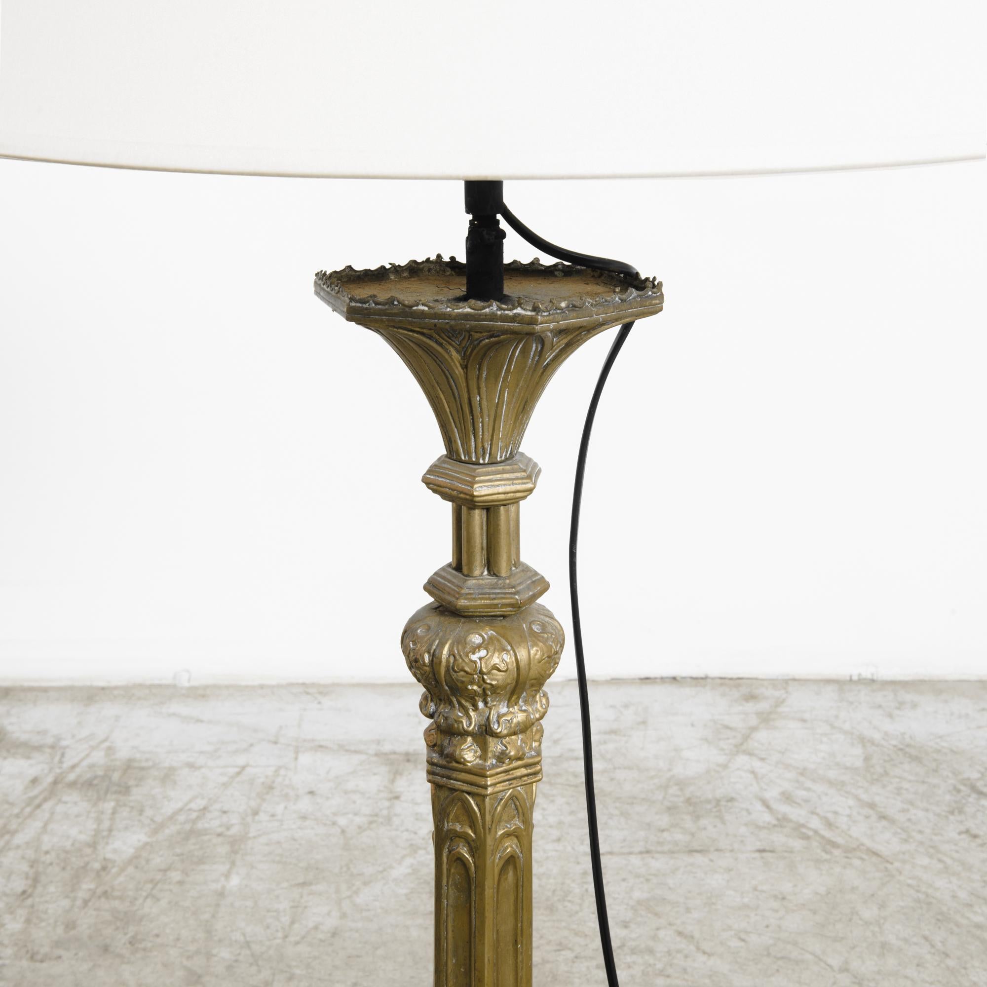 In the refined ambiance of late 19th-century France, this metal floor lamp from the 1880s stands as a testament to both elegance and innovation. Crafted with meticulous attention to detail, this piece exemplifies the enduring craftsmanship and
