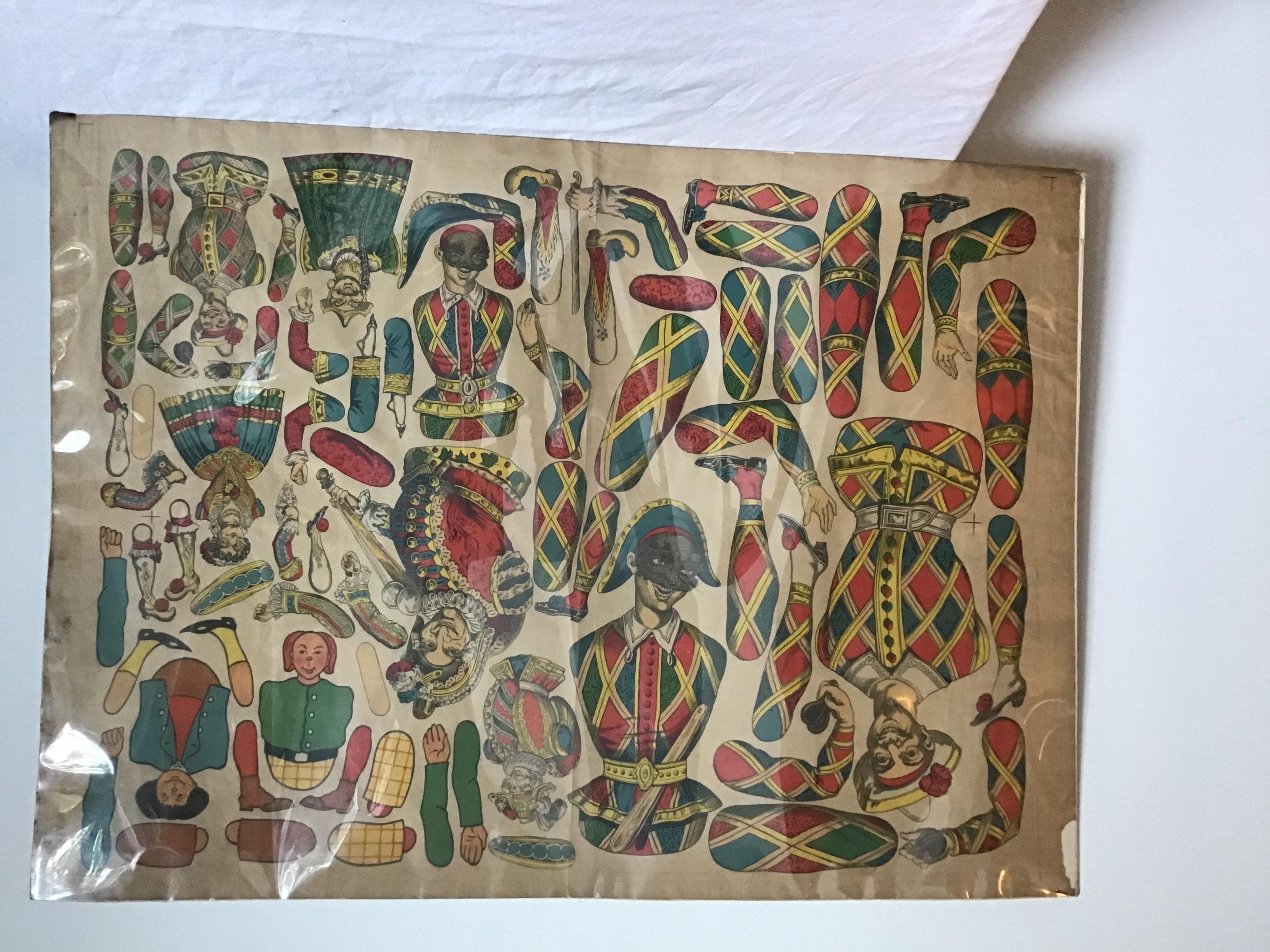 1880s French paper doll cutout sheet. Wrapped in a clear plastic wrap.