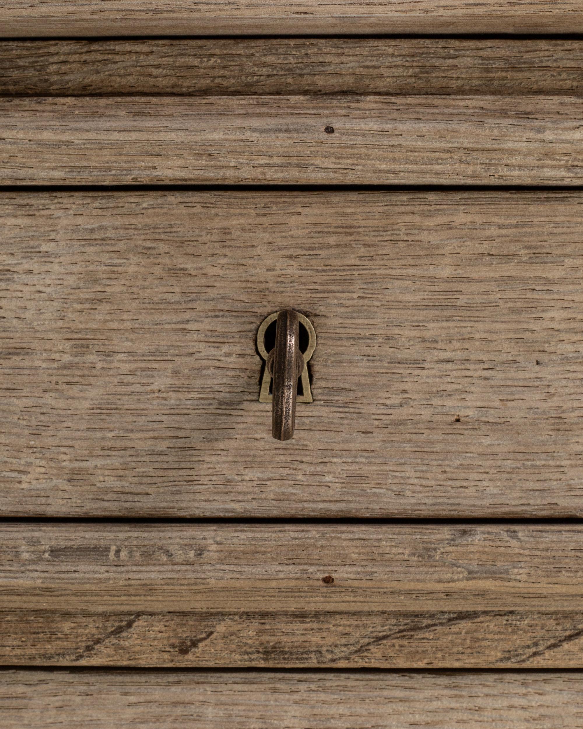 This 1880s French Provincial oak vitrine exemplifies the quiet elegance and honest craftsmanship characteristic of rural French interiors of the late 19th century. Constructed from solid oak with a softly aged patina, the piece features a balanced