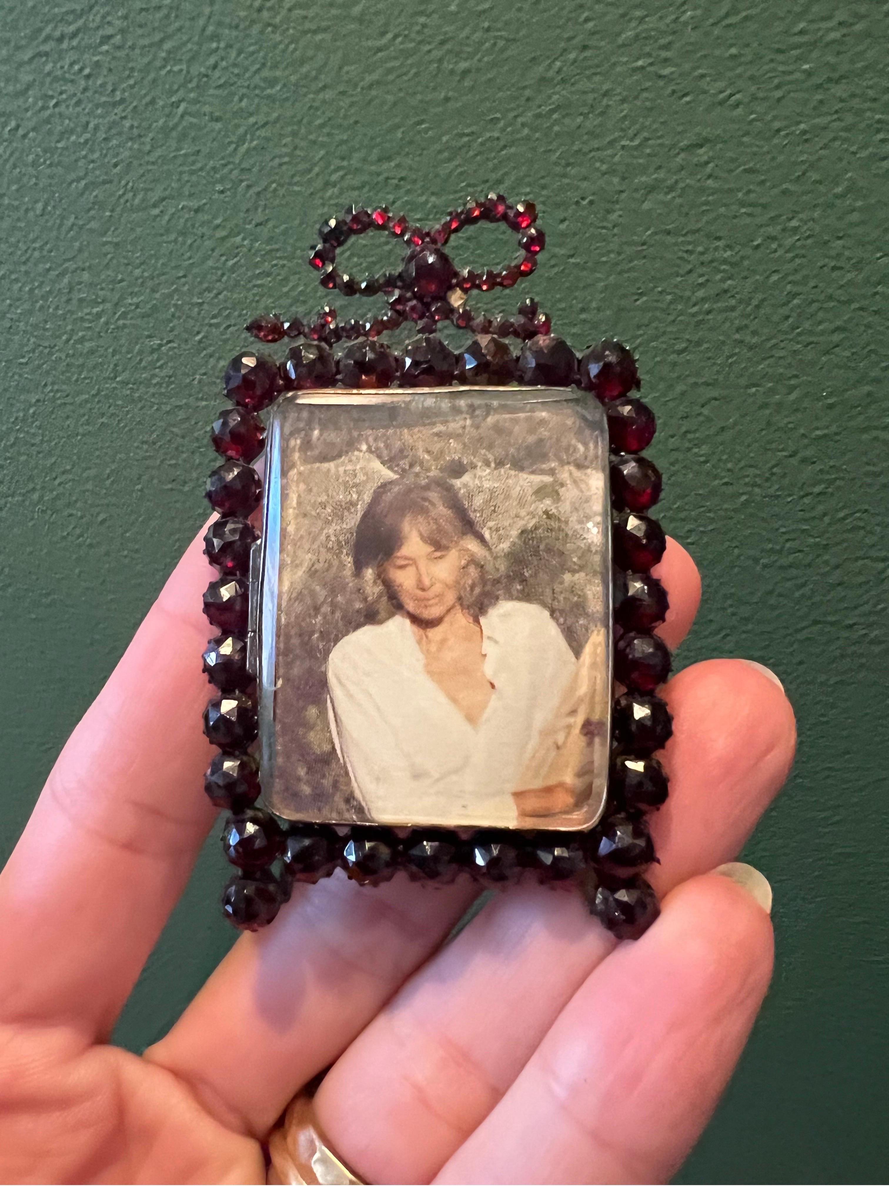 Mr. Giallo is opening his personal vault to sell a collection of his treasured antiques he's held on for so long.

ABOUT ITEM.
Such a special special frame made of antique garnets in sterling silver. This frame is meant to hold a very special