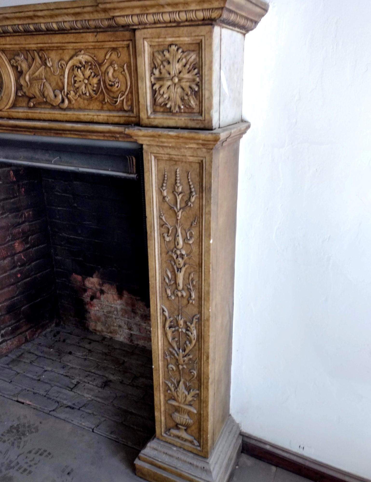American 1880s Hand Carved Gothic Carrara Marble Fireplace Mantel with Griffins and Urns