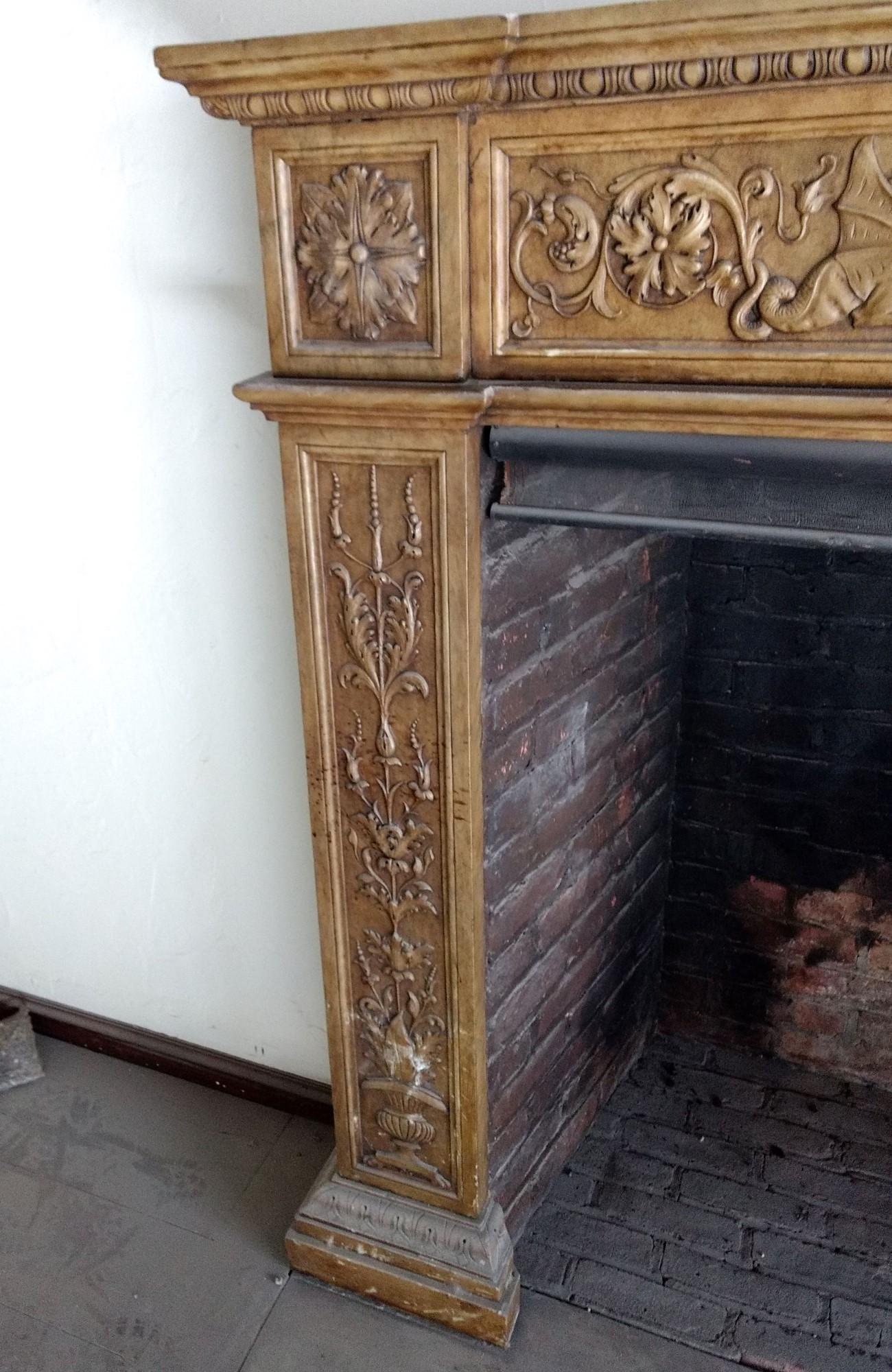 Hand-Carved 1880s Hand Carved Gothic Carrara Marble Fireplace Mantel with Griffins and Urns