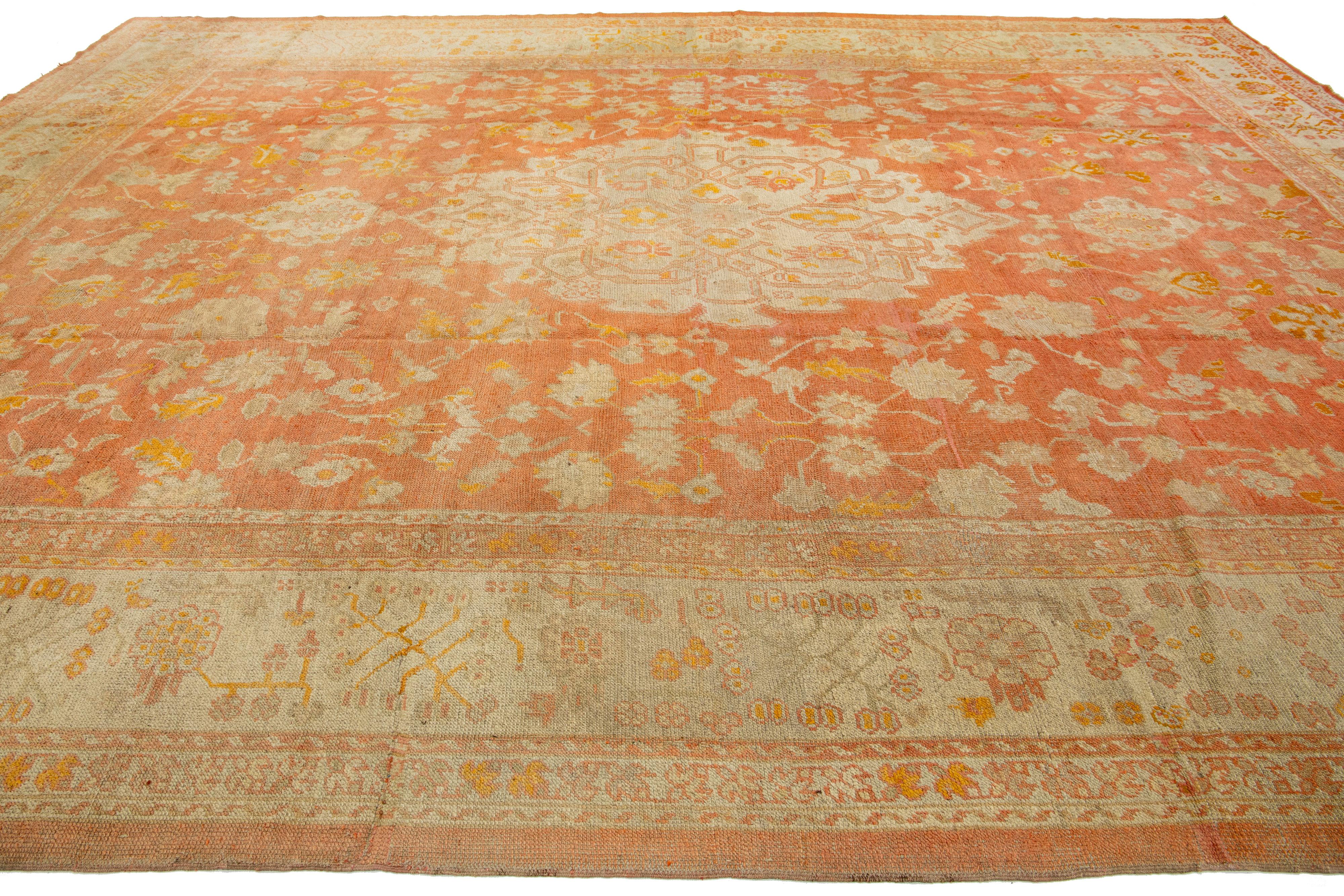 1880's Handmade Orange Turkish Oushak Wool Rug Featuring a Medallion Motif  In Excellent Condition For Sale In Norwalk, CT
