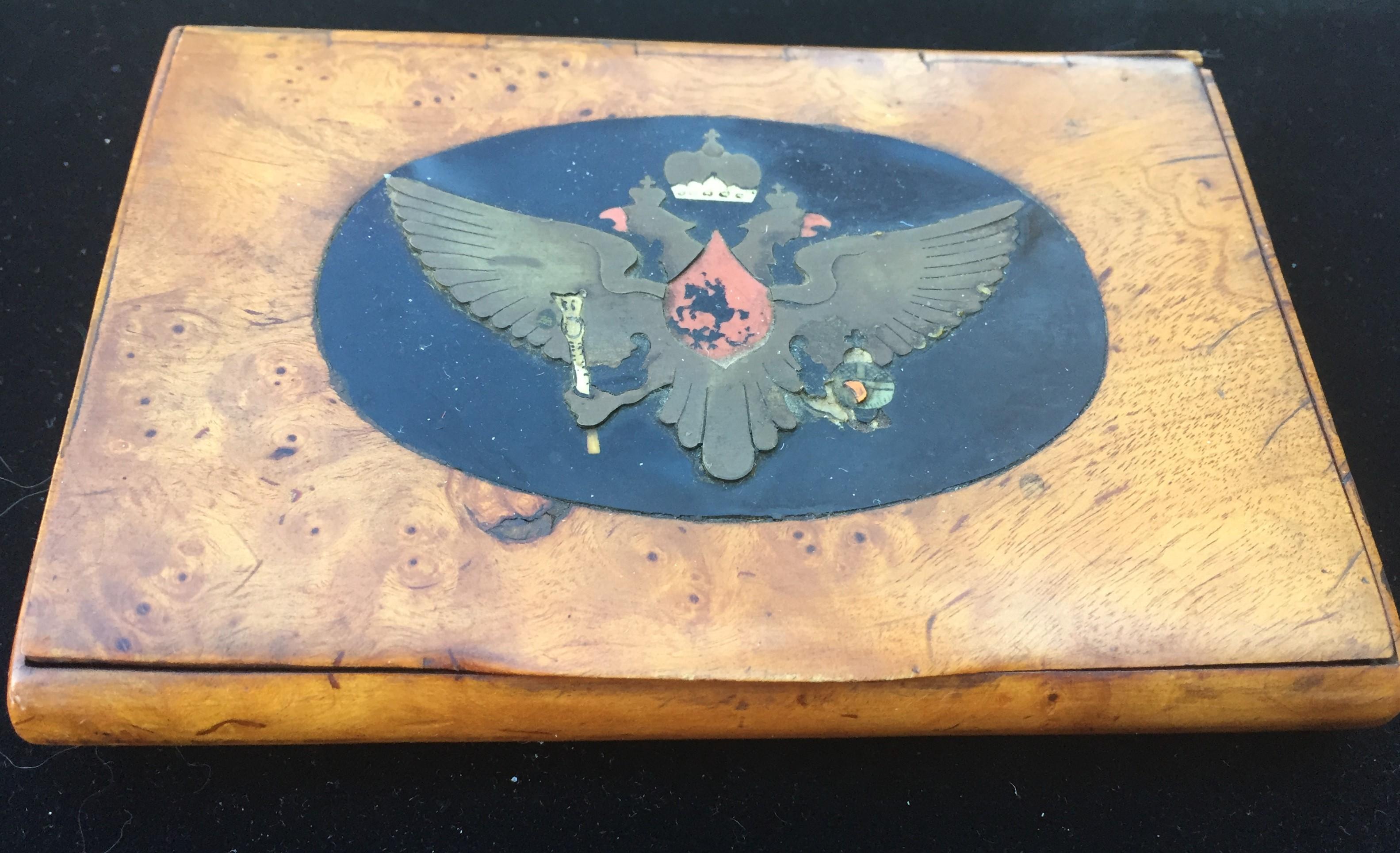 1880s Imperial Russian Faberge Romanov burl wood presentation cigarette case box coat of arms crest.

These cigarette cases were made in a limited number by the workshop of Peter Carl Faberge in St. Petersburg and given as a presentation gifts to