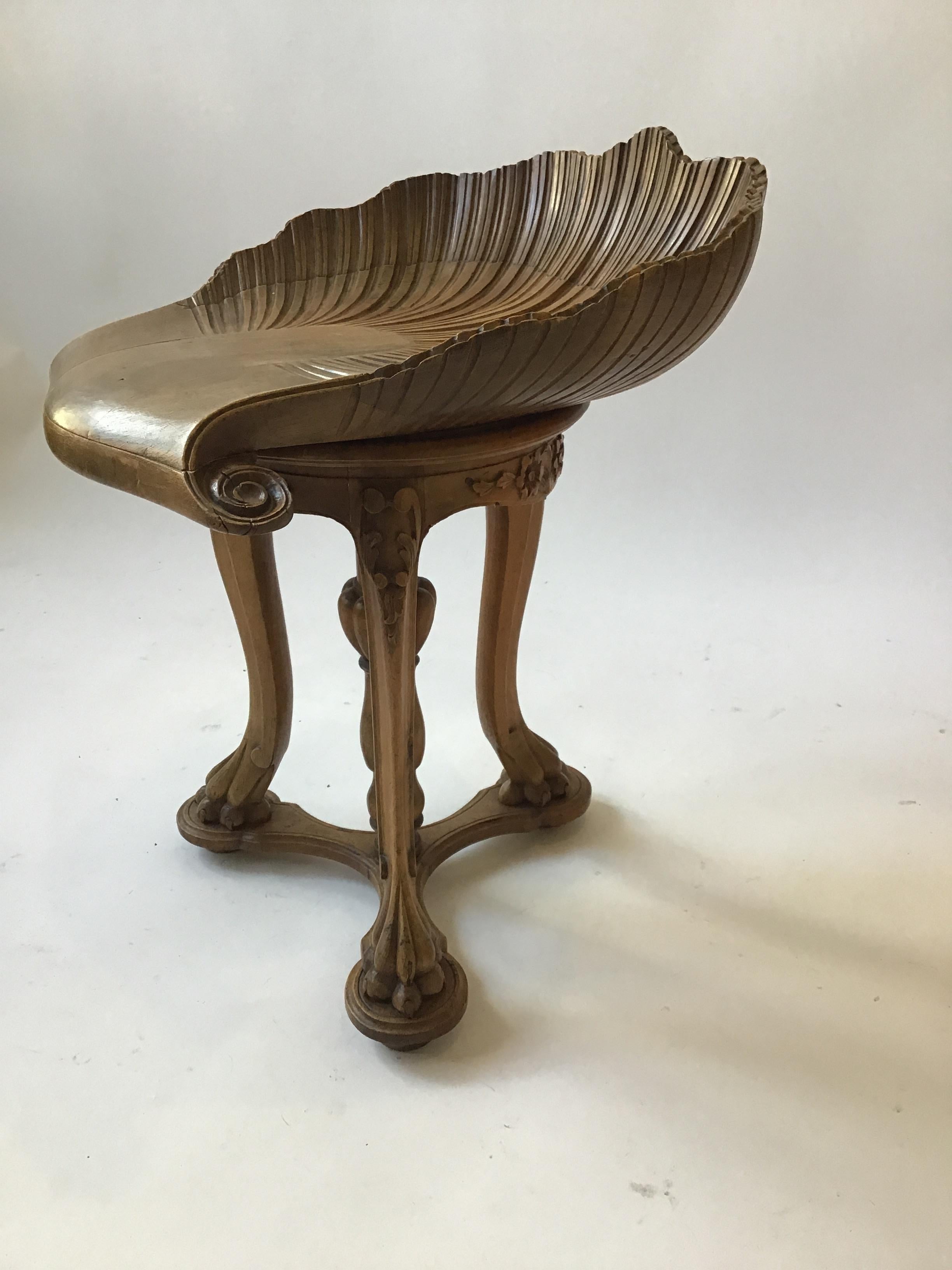 1880s Italian carved wood revolving seat fantasy stool. 
  