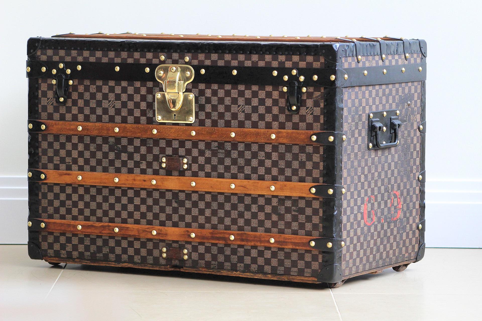Discover the epitome of timeless luxury with this exquisite Louis Vuitton Courier Trunk, a rare gem from the 1880s that embodies the heritage and exquisite craftsmanship of the iconic brand. This exceptional piece is a tribute to the era of grand