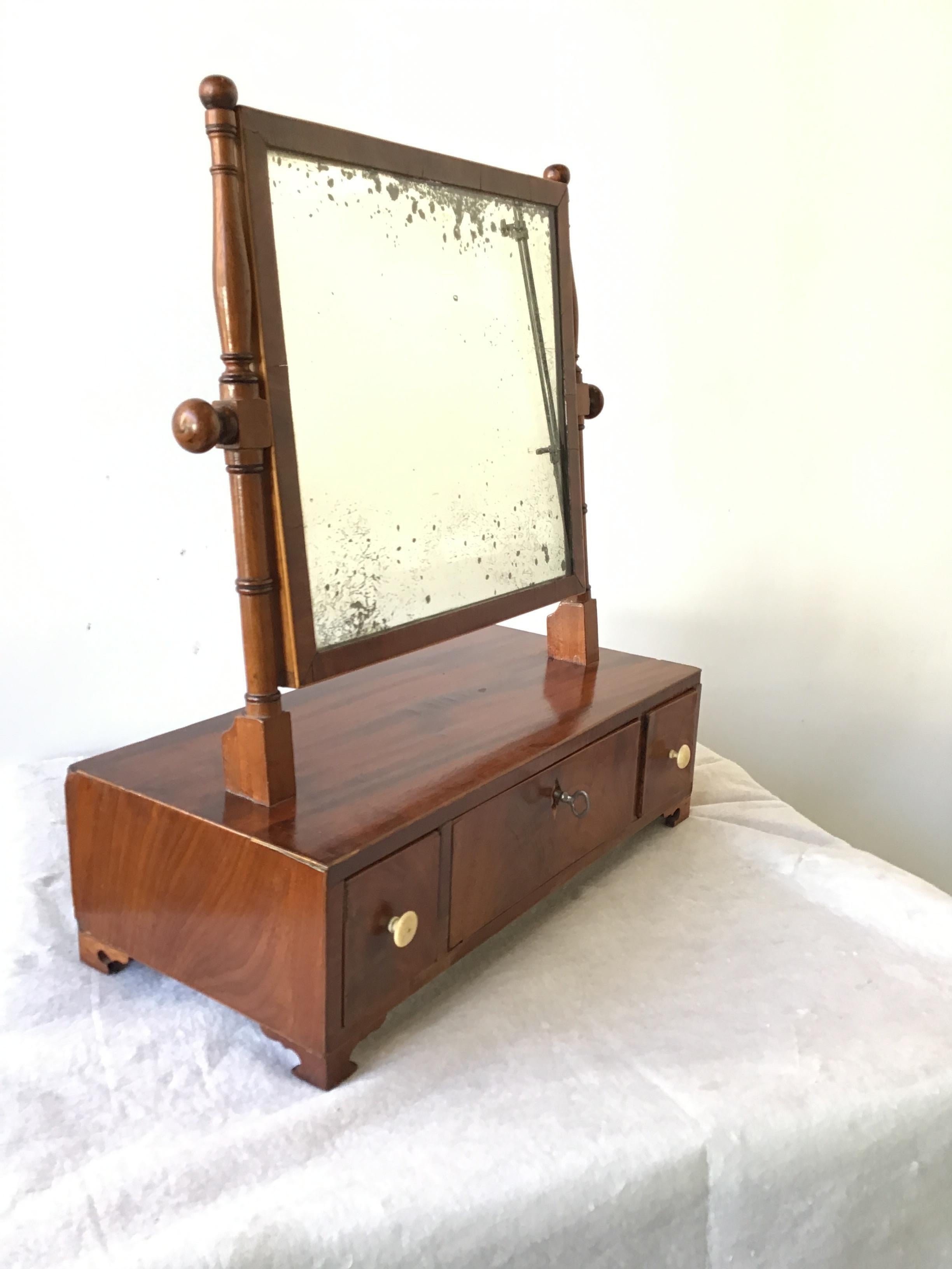 1880s Mahogany shaving mirror.