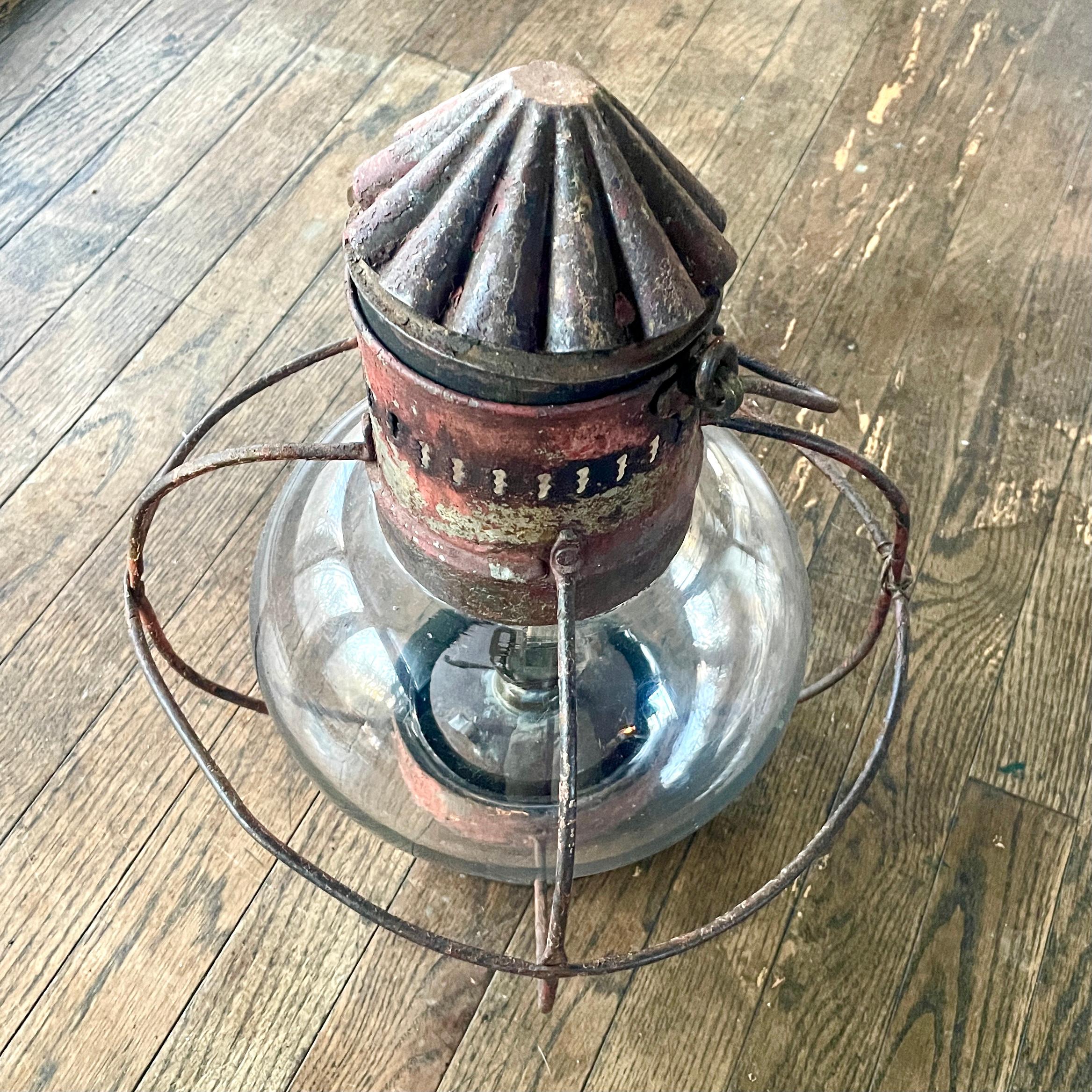 Nice antique onion lantern, unknown maker. A wonderful rustic decor for tabletop or hanging. Sold as a prop for decor only, the function of the oil canister is unknown and untested.