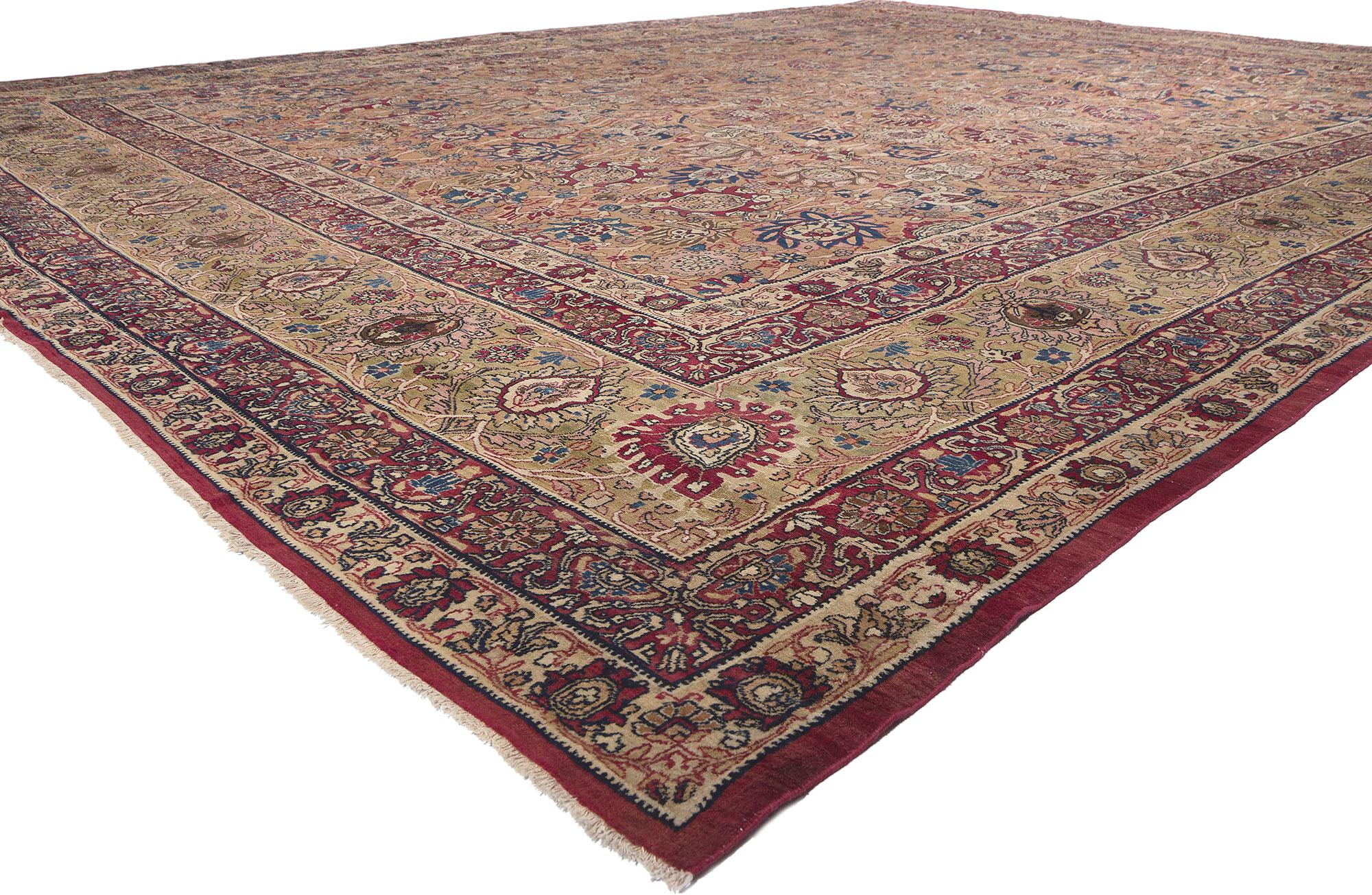 74298 Oversized Antique Persian Kermanshah Rug, 13'06 x 17'04. Embark on a journey where timeless elegance harmoniously converges with the principles of Biophilic Design in this hand-knotted wool antique Persian Kermanshah rug. Nature-inspired