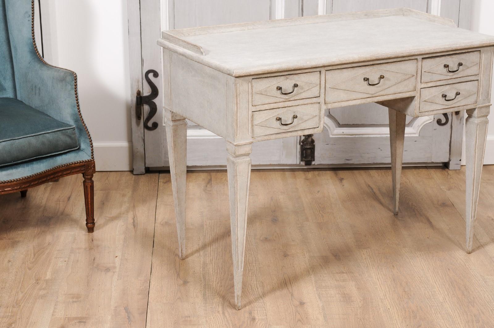 Carved 1880s Swedish Gustavian Style Painted Desk with Five Drawers and Tapered Legs For Sale