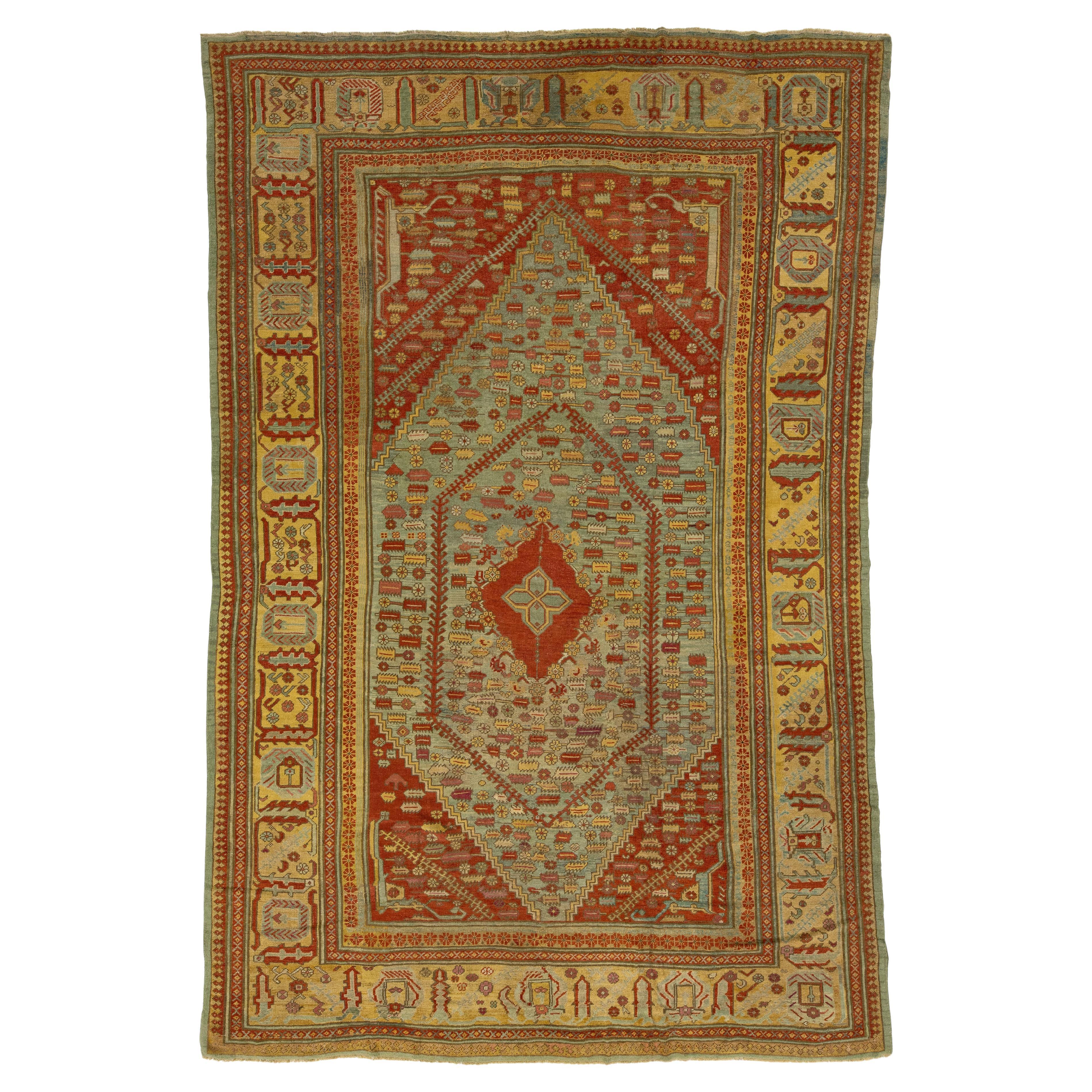 1880s Turkish Oushak Antique Wool Rug In Blue Featuring a Medallion Design