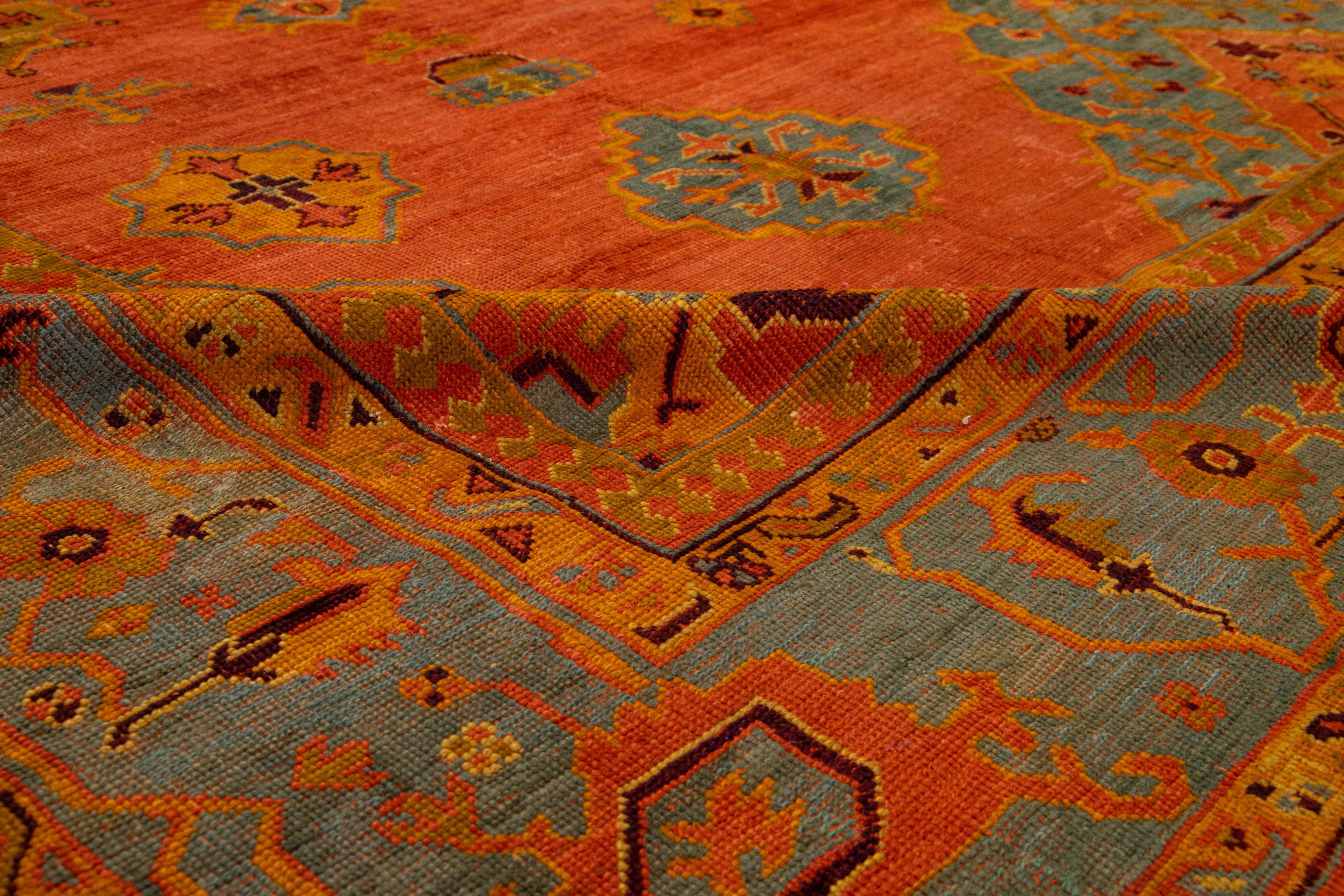 Hand-Knotted 1880s Turkish Oushak Wool Rug Handmade In Red- Rust Featuring an Allover Motif  For Sale