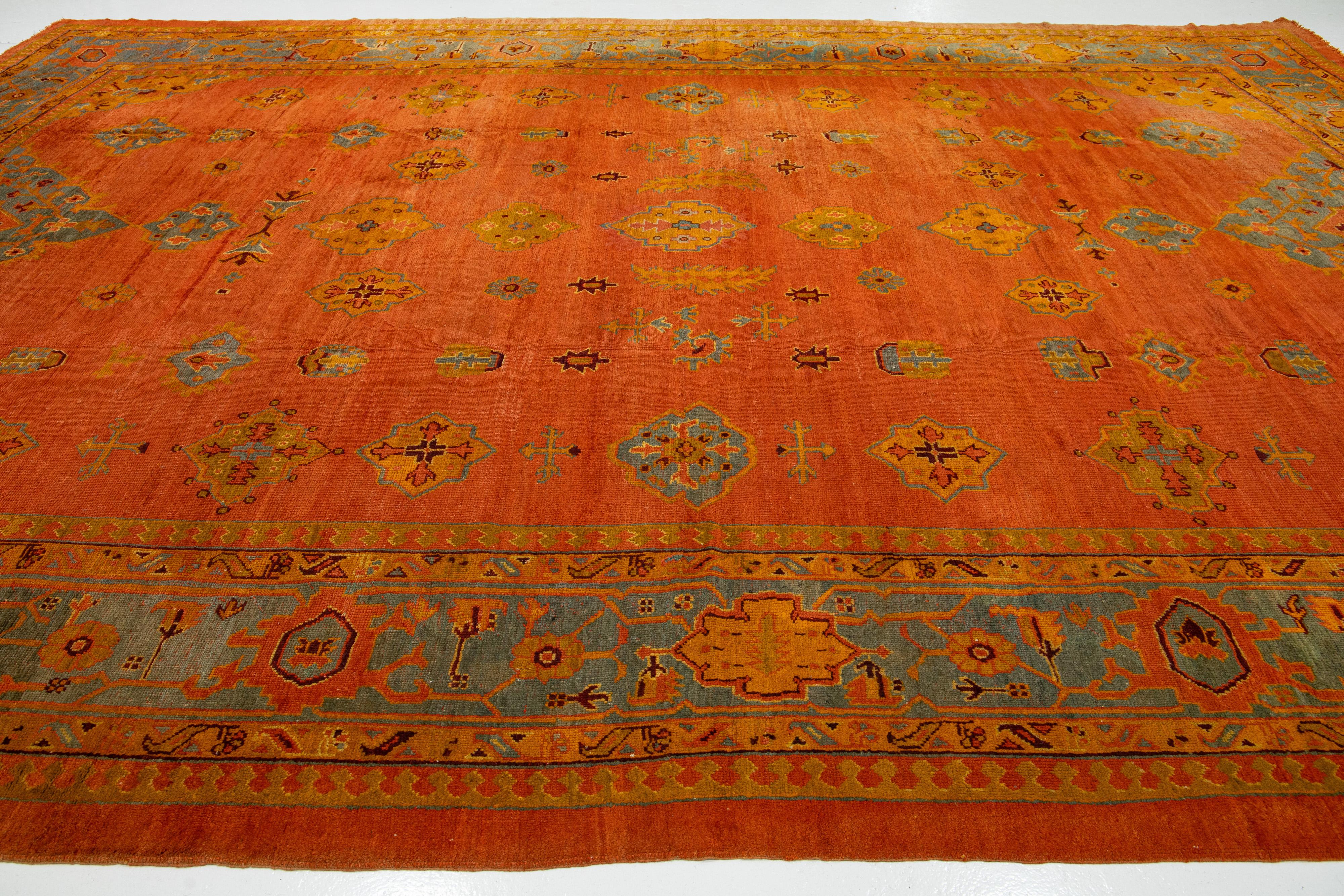 1880s Turkish Oushak Wool Rug Handmade In Red- Rust Featuring an Allover Motif  For Sale 1
