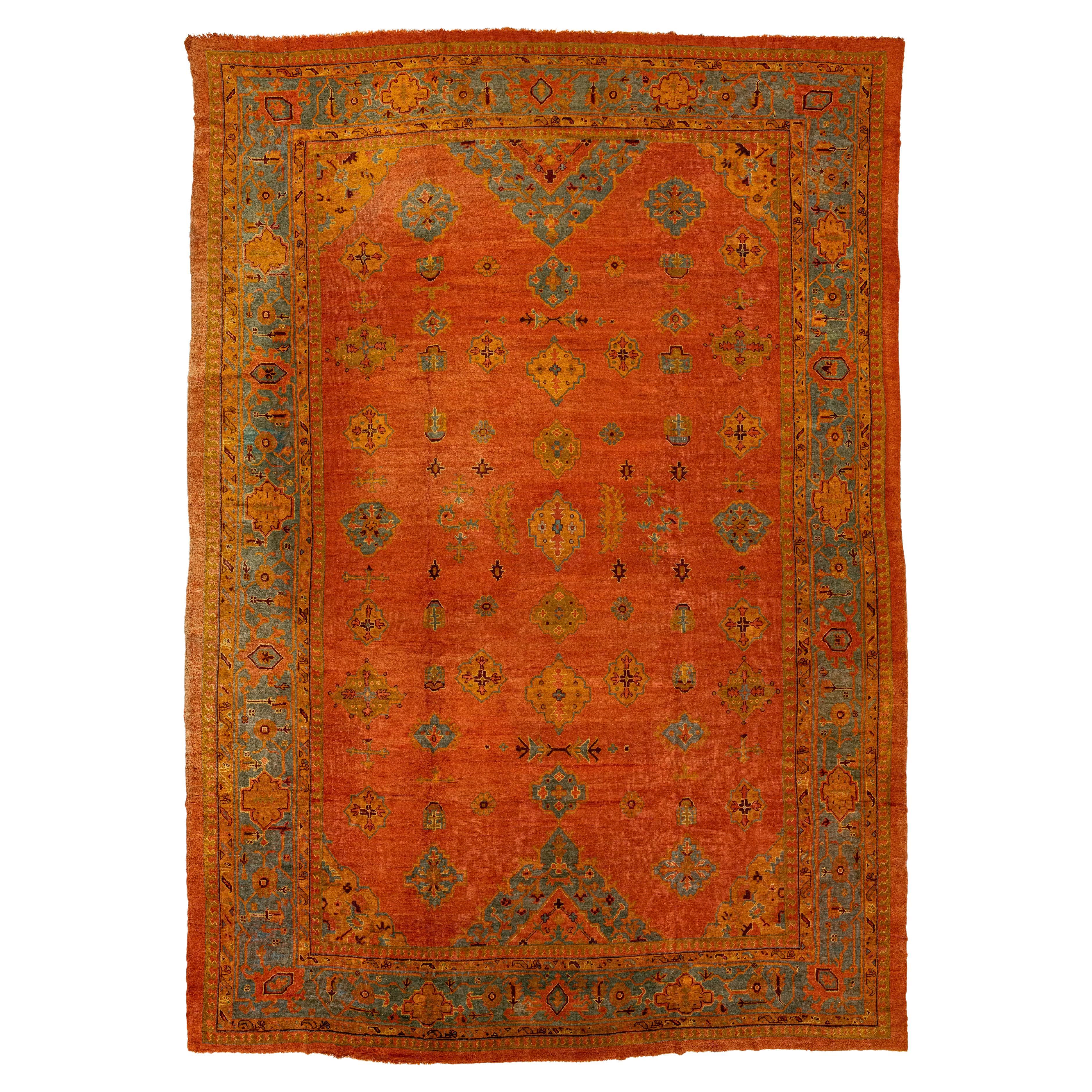1880s Turkish Oushak Wool Rug Handmade In Red- Rust Featuring an Allover Motif 