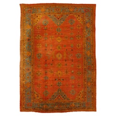 Antique 1880s Turkish Oushak Wool Rug Handmade In Red- Rust Featuring an Allover Motif 