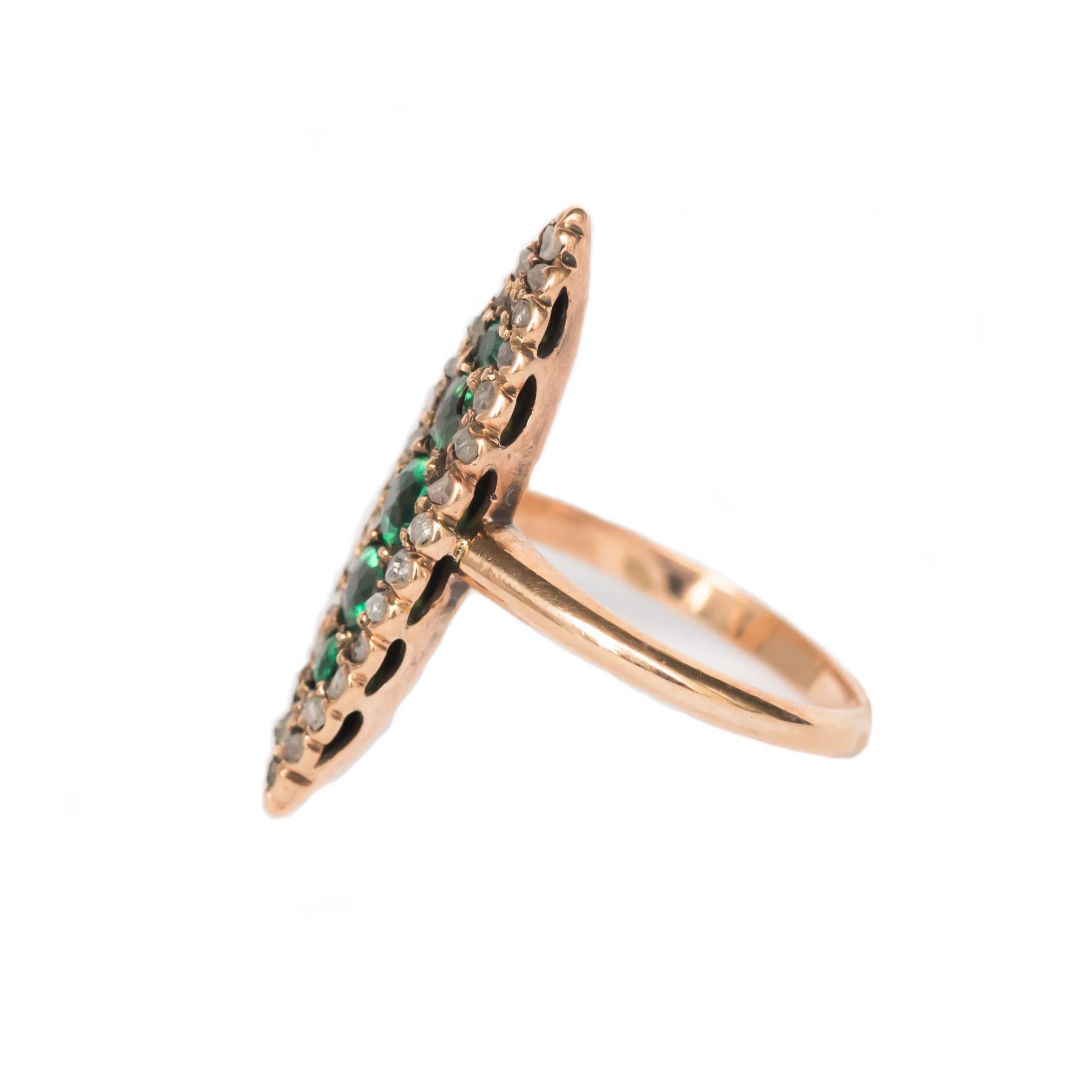 Item Details: 
Ring Size: 3
Metal Type: 14 Karat Rose Gold
Weight: 2.0 grams

Color Stone Details: 
Type: Emerald, natural 
Carat Weight: .30 carat, total weight.
Color: Green

Diamond Details
Shape: Antique Rose Cut
Carat Weight: .20 carat, total