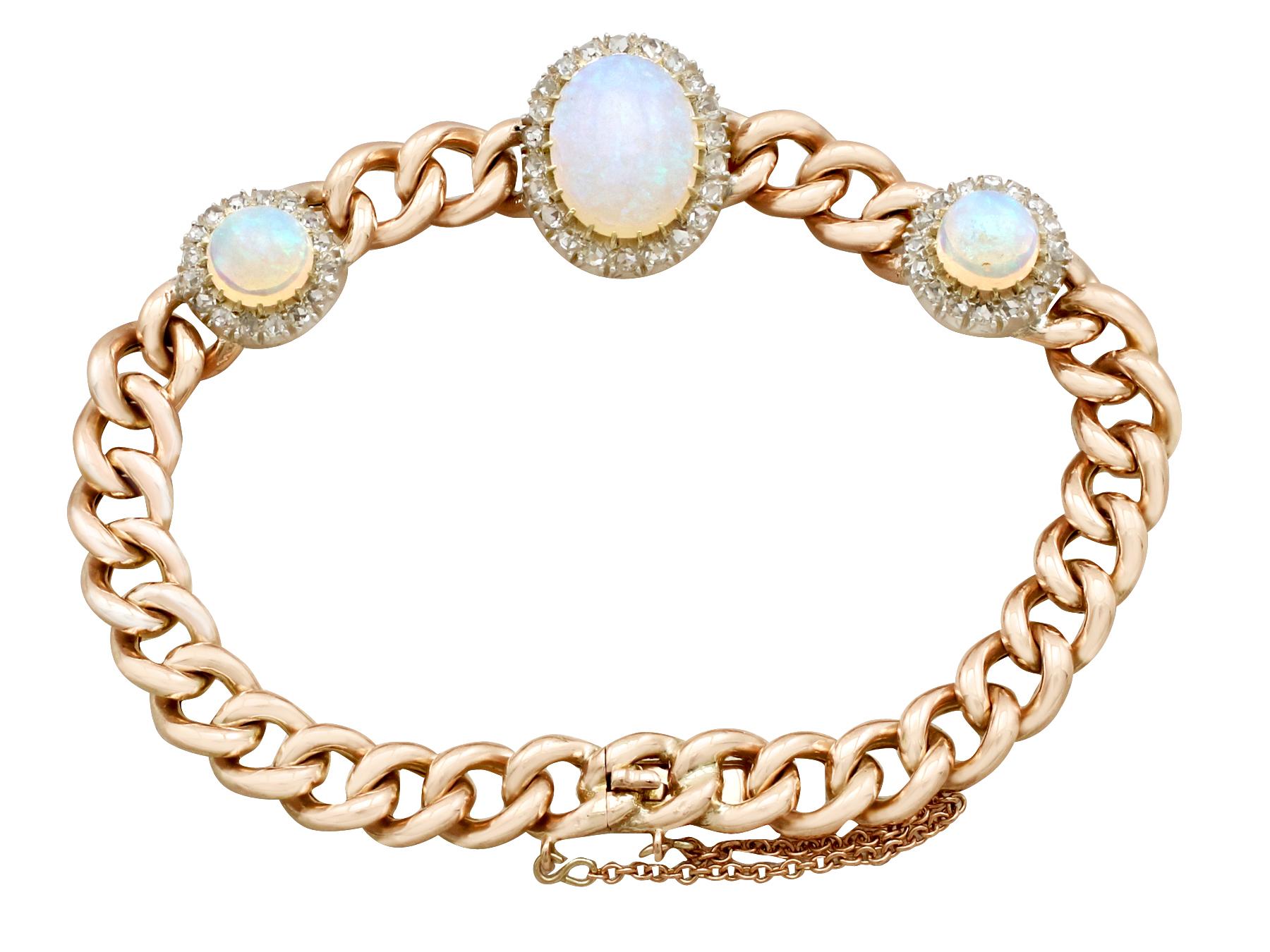 A stunning Victorian 3.83 carat white opal and 1.12 carat diamond, 18 karat yellow gold and silver set bracelet; part of our diverse antique jewelry and estate jewelry collections.

This stunning, fine and impressive antique cabochon cut opal and