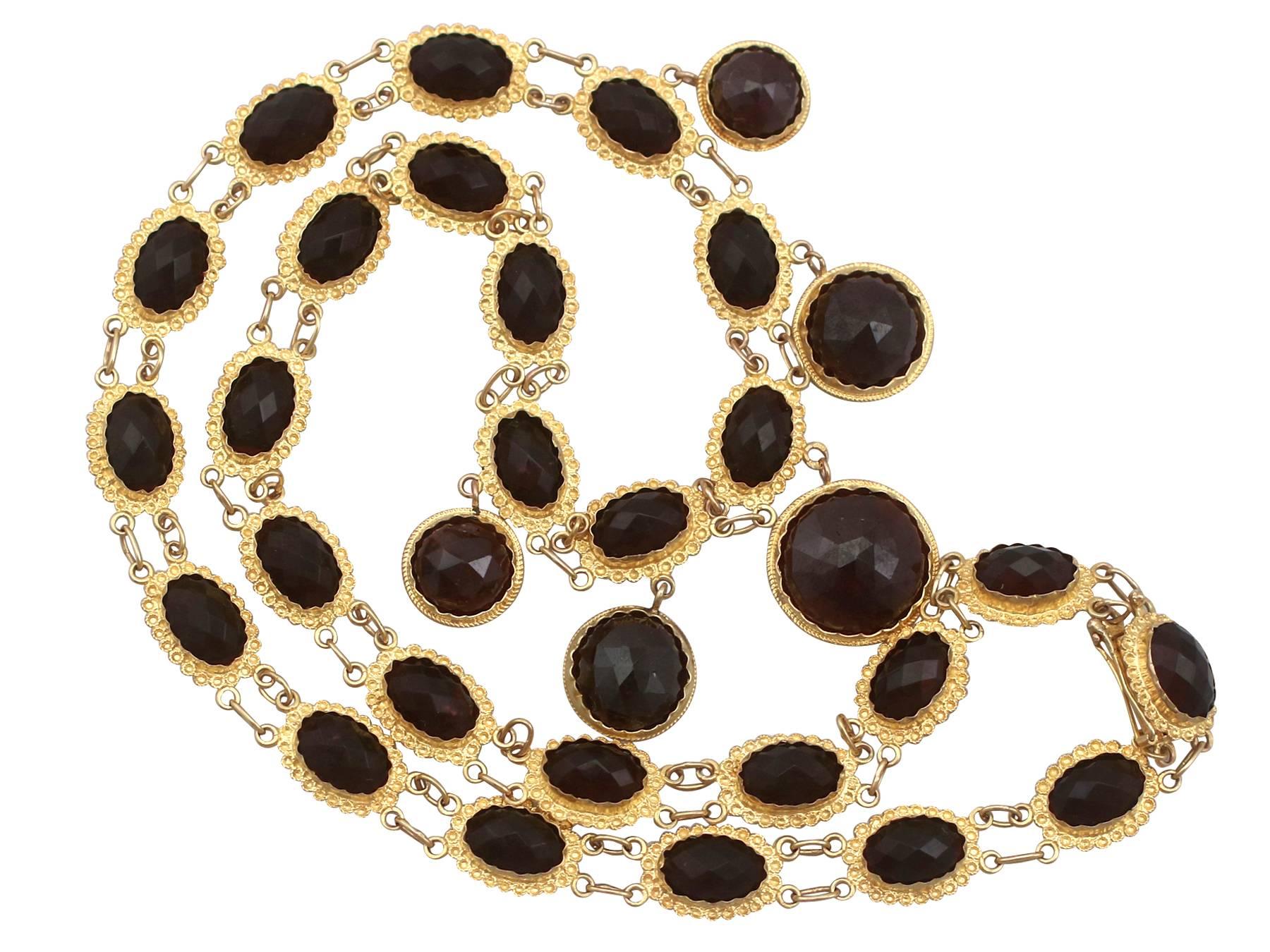 A stunning antique Victorian 49.43 carat garnet and 18 karat yellow gold necklace; part of our diverse antique jewelry and estate jewelry collections

This stunning, fine and impressive Victorian garnet necklace has been crafted in 18k yellow