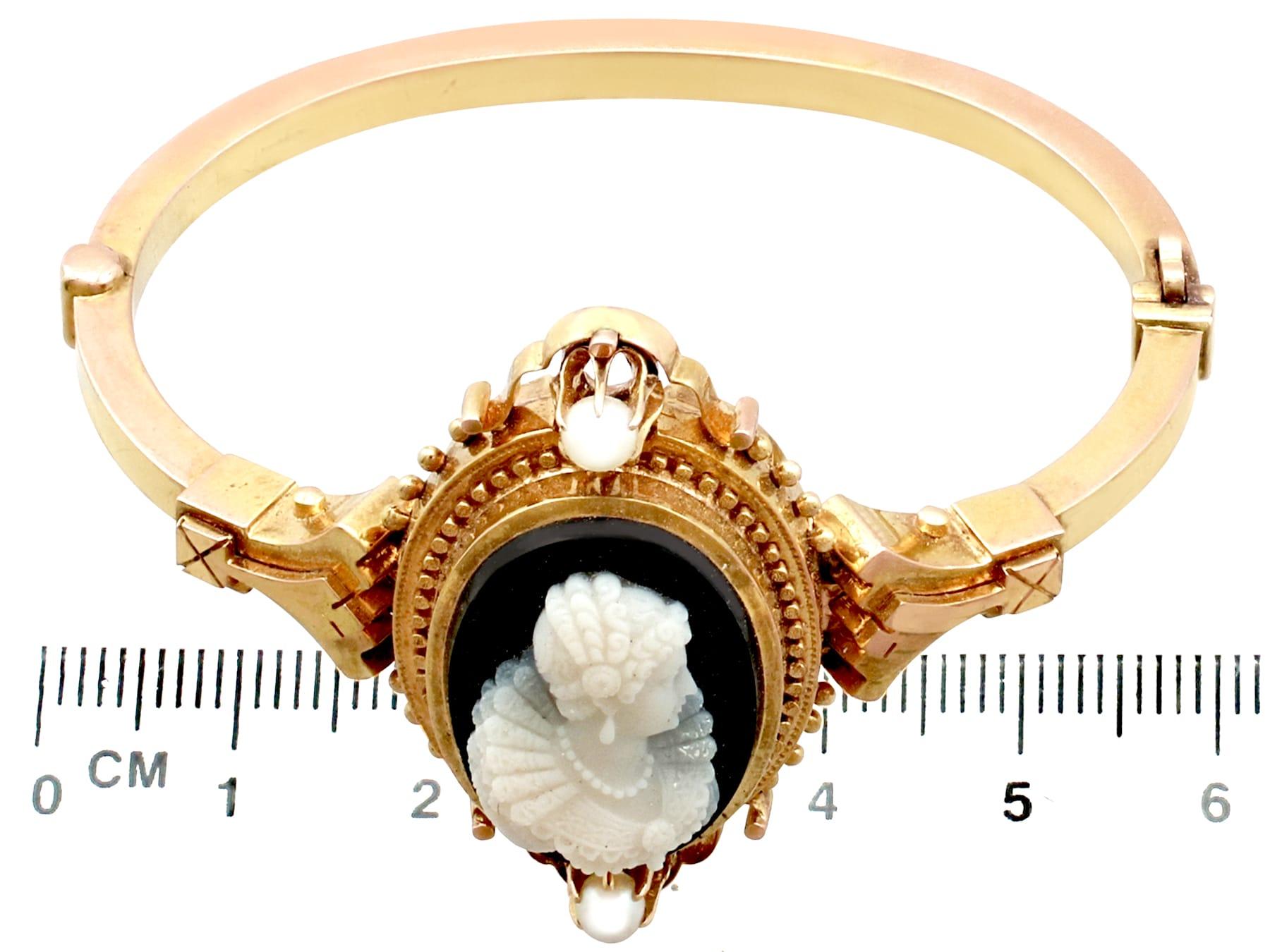 Oval Cut 1880s Victorian Cameo Bangle Bracelet with Pearls in Yellow Gold For Sale