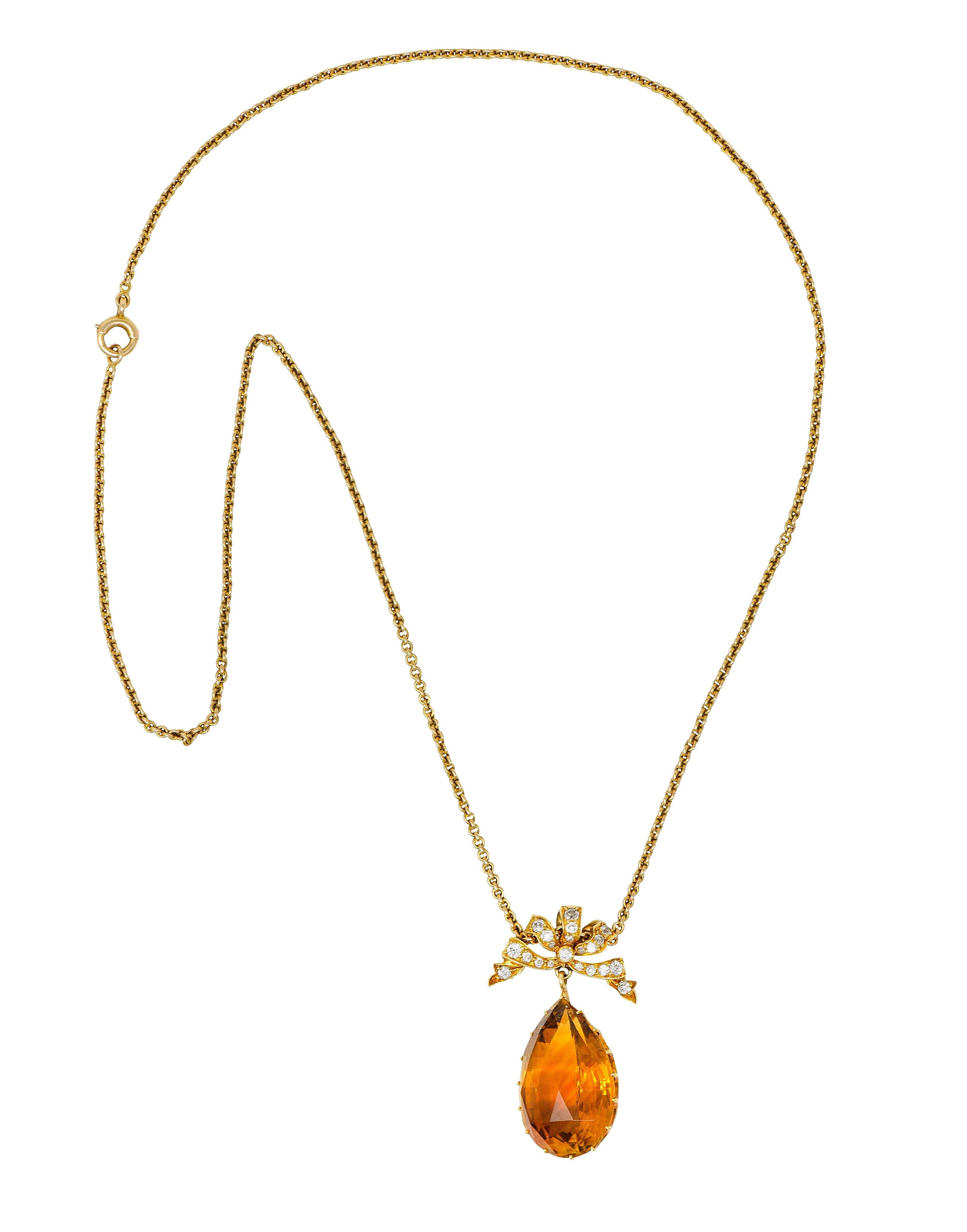 Cable chain necklace suspends a pendant with a ribboned surmount with a citrine drop

Bow is bead set with old European cut diamonds

Weighing in total approximately 0.50 carat - G to J color with SI clarity

Mixed pear cut citrine is transparent