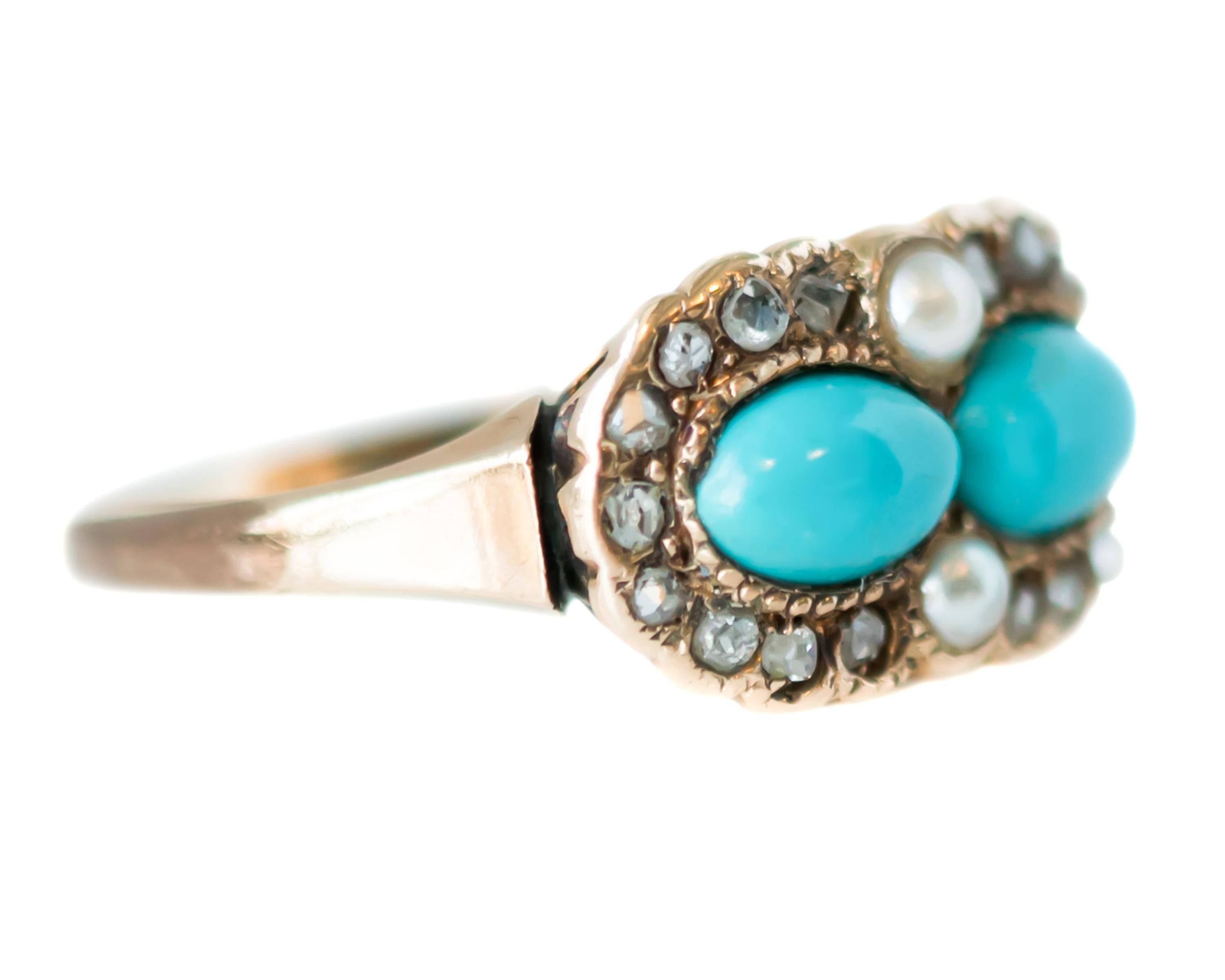 1880s Victorian Turquoise Ring - 9 Karat Yellow Gold, Turquoise, Pearls, Diamonds

Features:
18 Rose Cut Diamonds
2 Pearls
2 Oval Turquoise Cabochons
9 Karat Yellow Gold which has developed a Rosy Patina
Intricate design Open Gallery
Shank tapers to