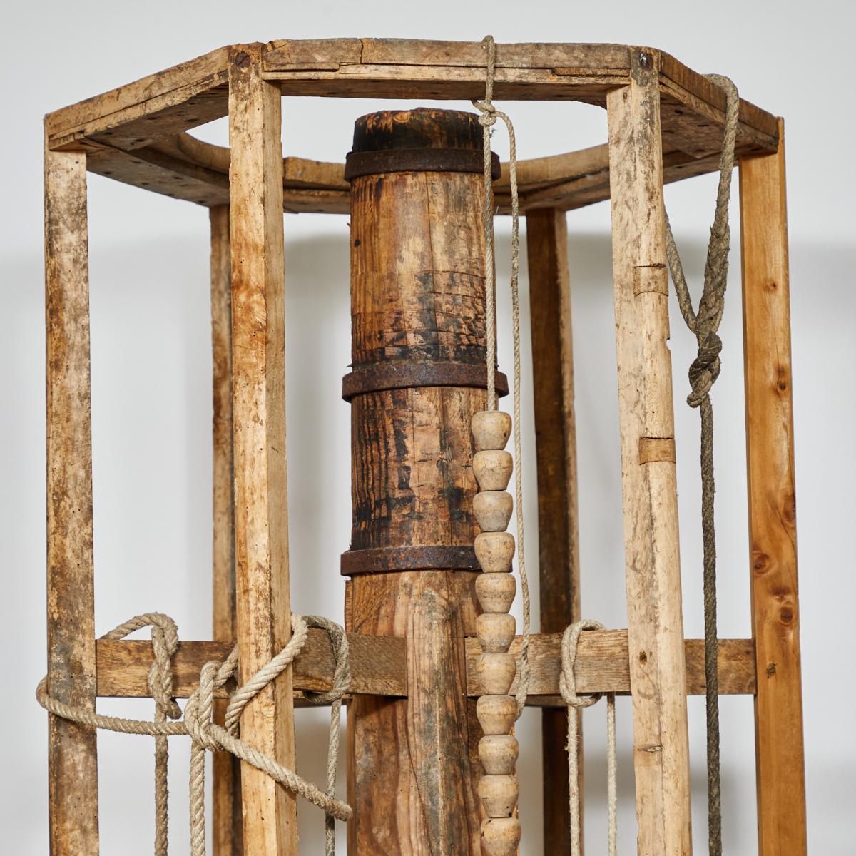 1880s wood grain element as sculpture. Tall, primitive wood can be placed indoors or outdoors.