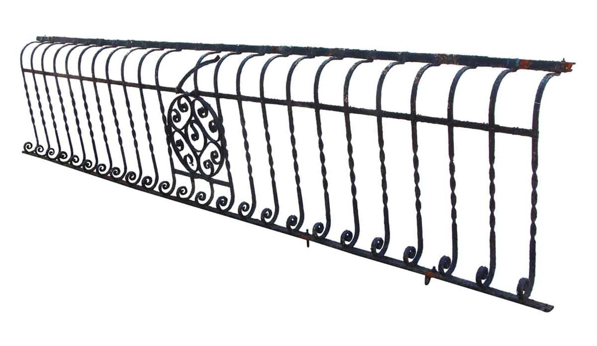 1880s wrought iron balcony with turns and curls and a central medallion. The balcony bows out approximately 8 inches in a Bombay style. Small quantity available at time of posting. Please inquire. Priced each. This can be seen at our 400 Gilligan St