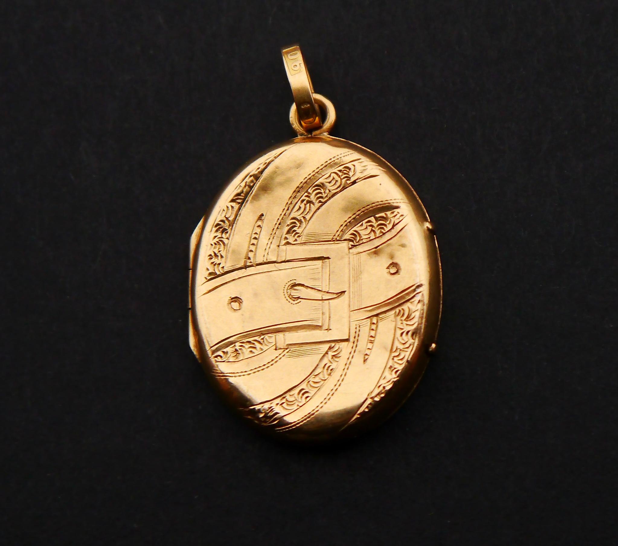 Antique Pendant / Locket made of solid 18K Yellow Gold. Miniature hand-engraved ornaments on both sides. Two internal removable bezels inside, no glass.

Swedish XIX cent hallmarks / 18K, Stockholm. Maker's marks, Stockholm.

Year hallmarks D6 =