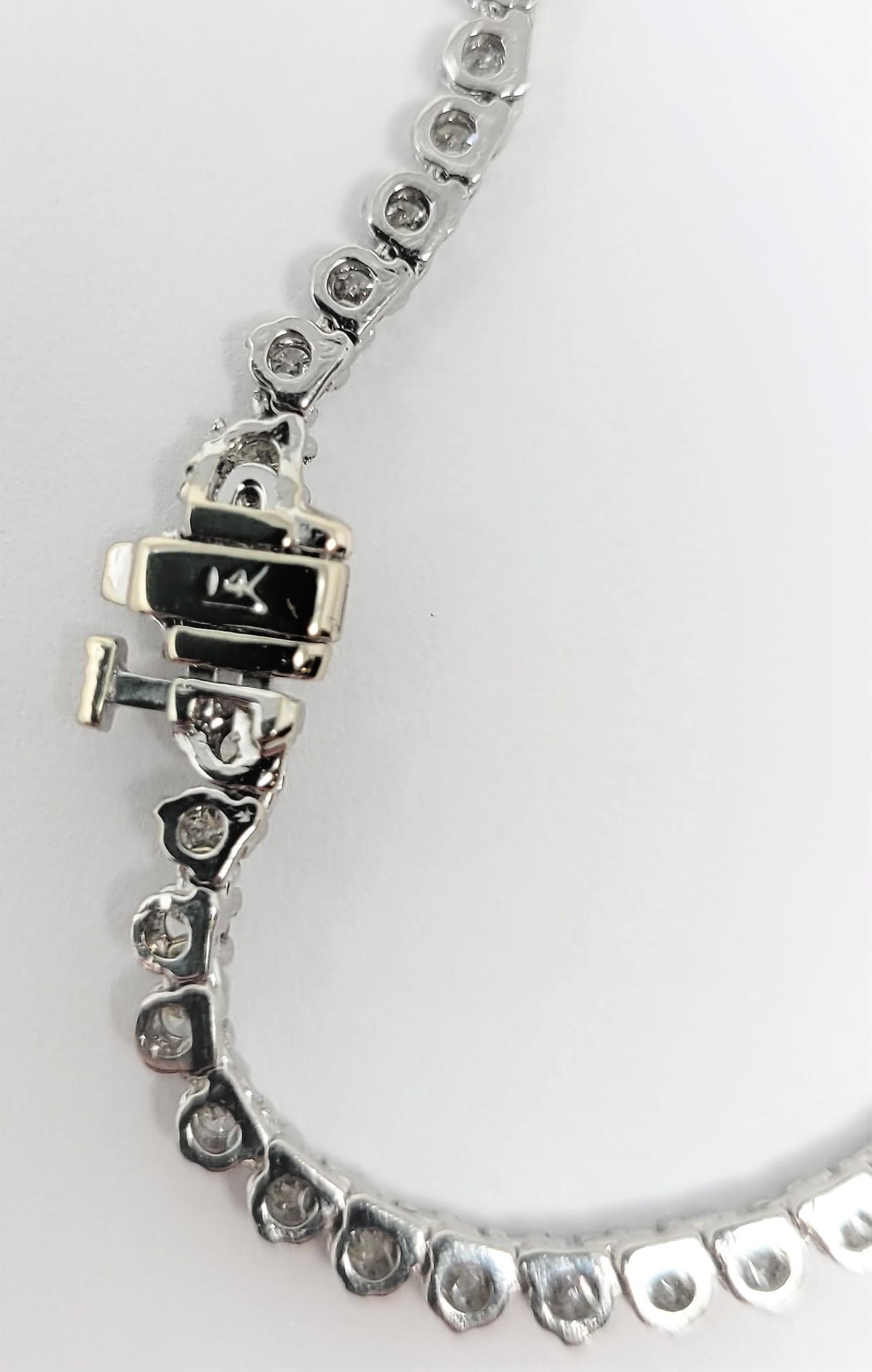 18.82 Carat Tanzanite and Straight Line Diamond Necklace In Good Condition For Sale In Dallas, TX