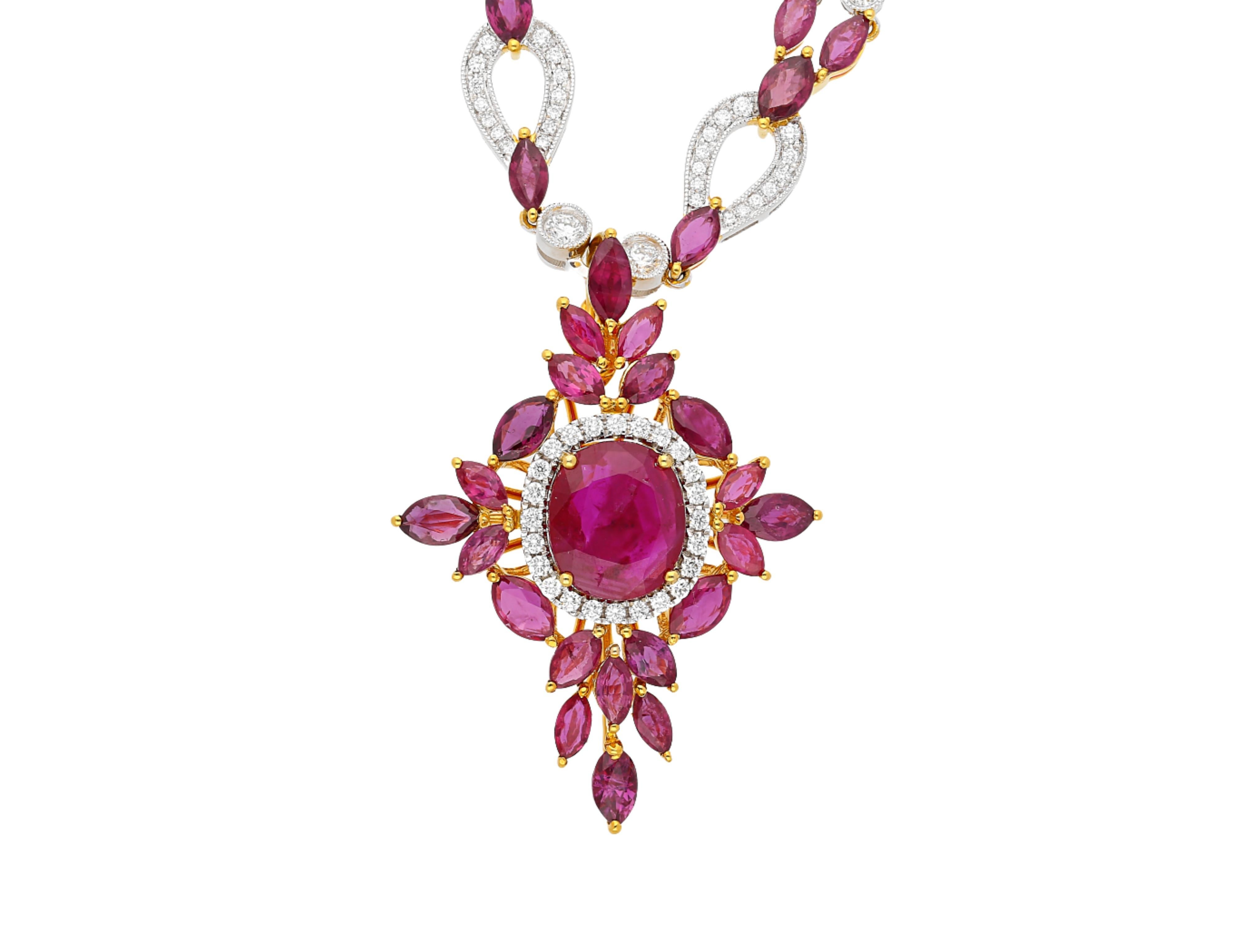 15.66 carat Ruby and 3.17 carat Diamond mixed cut cross pendant necklace. Set in a two tone 18 karat yellow and white gold. Featuring a 2.35 carat oval cut center stone, 67 mixed cut Ruby accents of 13.31 carats, and 226 round cut diamonds of 3.17