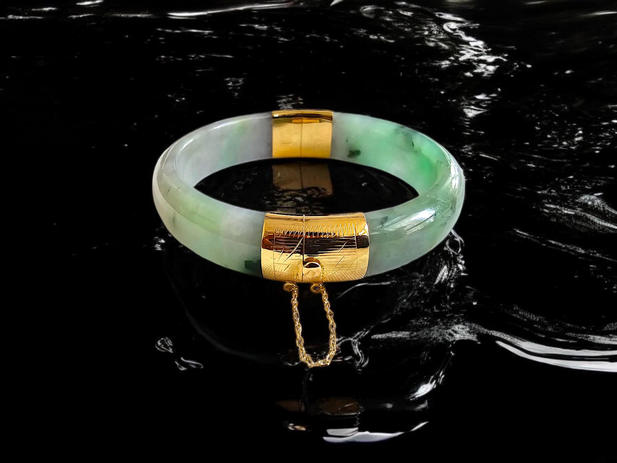 1883 Viceroy's Elliptical Green and Lavender Purple Burmese A-Jade Jadeite Bangle Bracelet (with 14K Yellow Gold)

Using the best Handpicked untreated natural A-Jadeite from Burma, we created an authoritative and classy statement bangle bracelet.