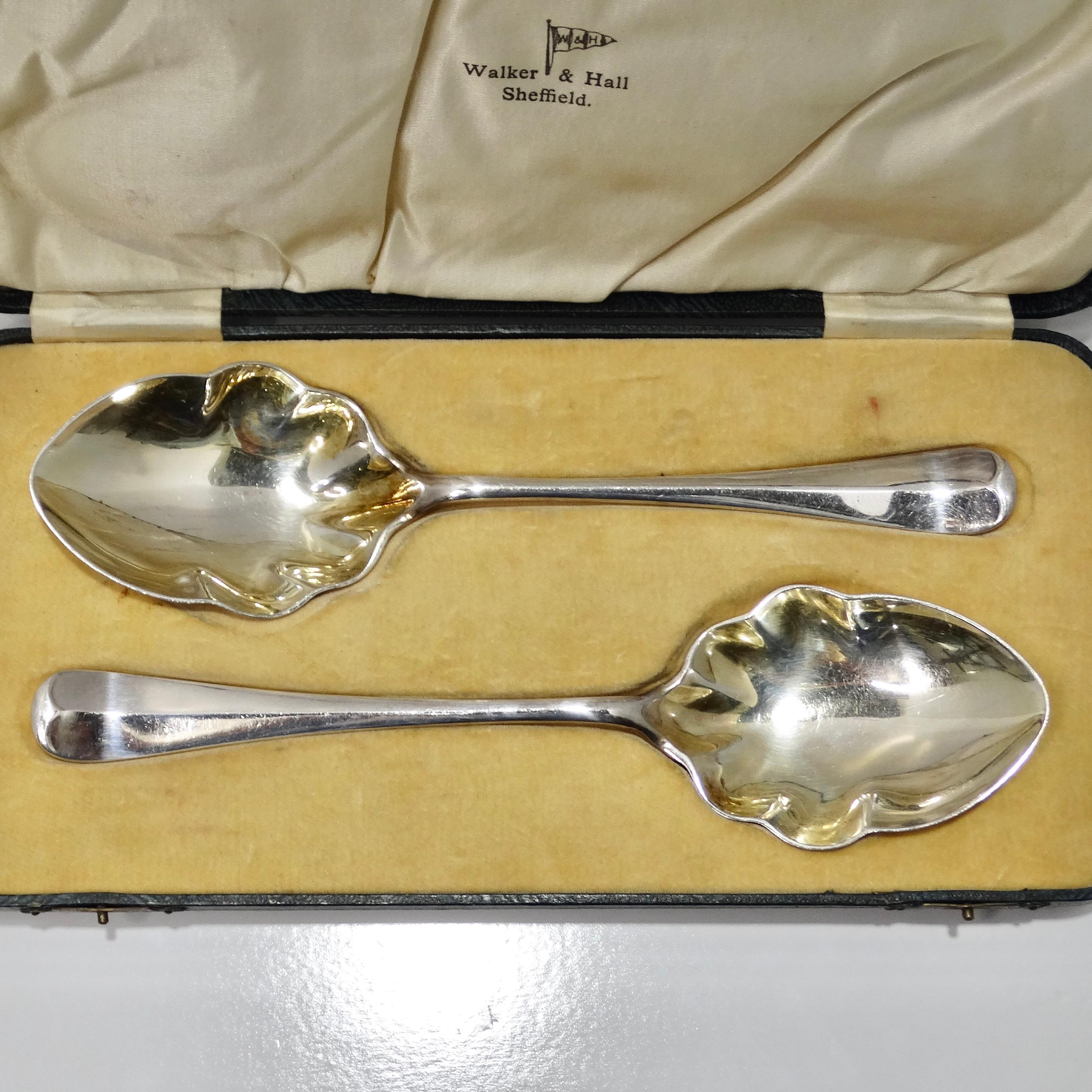 Introducing the exquisite 1885 Antique Walter & Hall Victorian Plate Berry Spoons, a stunning set that epitomizes the opulence and charm of the Victorian era.

Crafted with meticulous attention to detail, these two berry spoons are plated with