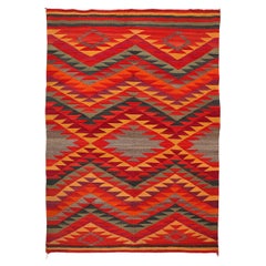 Antique 1885 Navajo Weaving in Jewel Tones, Red, Yellow, Orange, and Brown