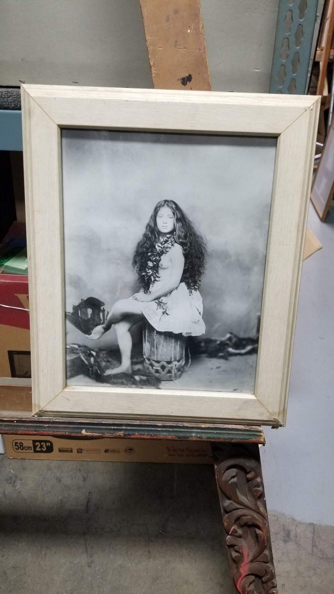 Commercial hula performer in a pau (skirt) circa 1885, several decades after Hawaiian women adopted holok ū for everyday domestic purposes (photo courtesy of the Bernice P. Bishop Museum). The Artwork print comes in a solid oak frame painted white