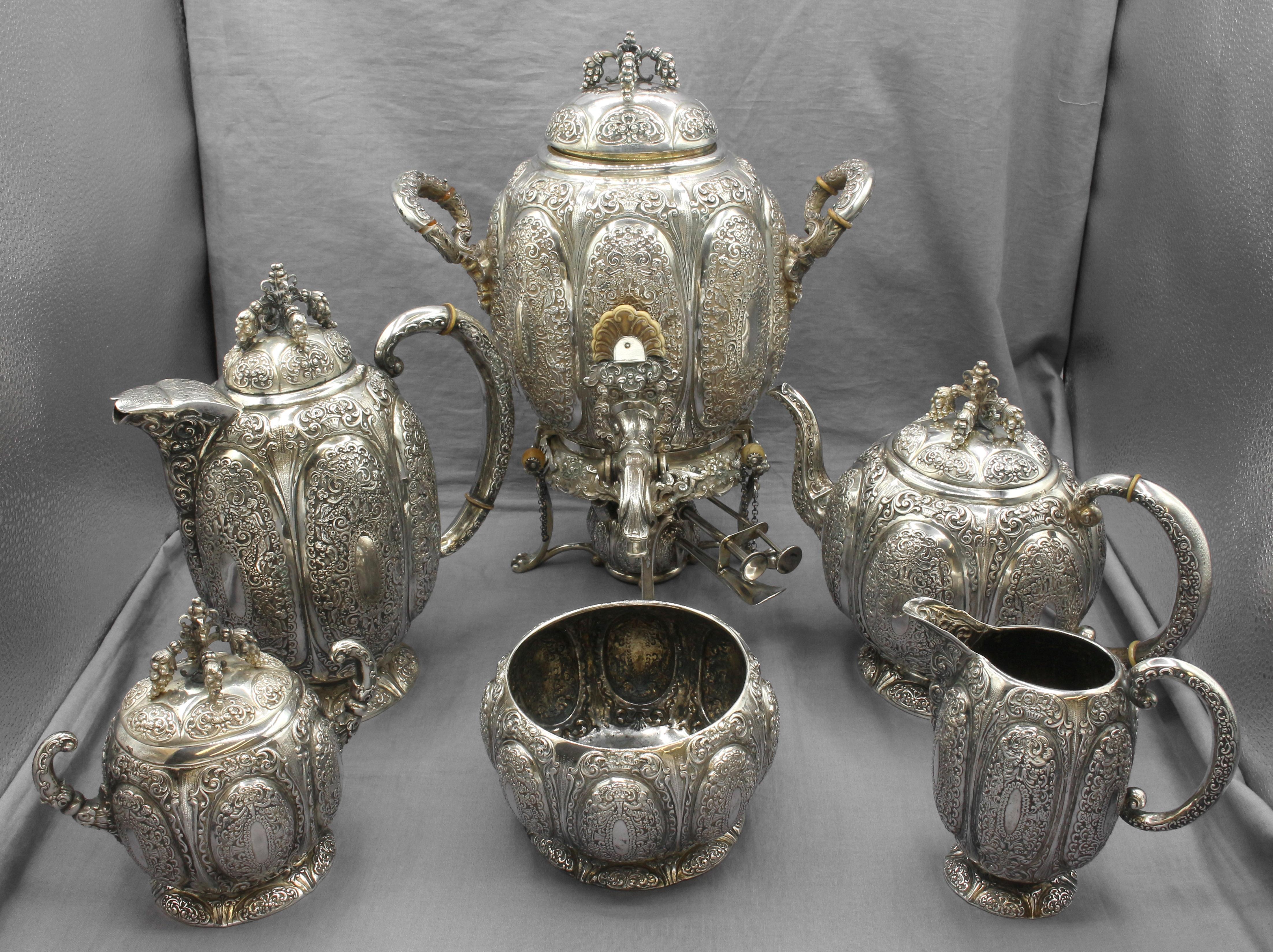 1886-1891 Renaissance Revival Silver Tea & Coffee Service, Germany. A magnificent set including hot water kettle on stand. Made by J.D. Schleissner & Sons, Hanau under the direction of son Daniel Philipp August Schleissner (1825-1891). This set was