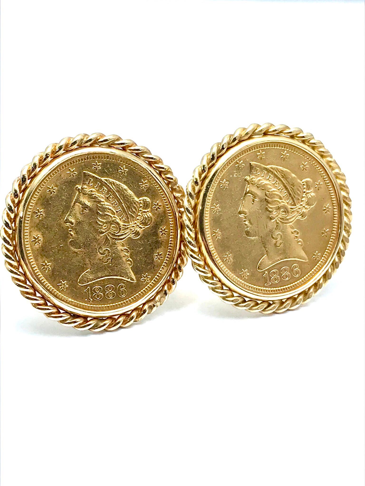 A classic pair of 1886 United States five dollar gold coin cufflinks.  Minted in the US, the coins 0.999 pure gold, set in 14 karat gold frames with a rope edge.  These cufflinks are a timeless set to add to anyone's collection.  The cufflinks