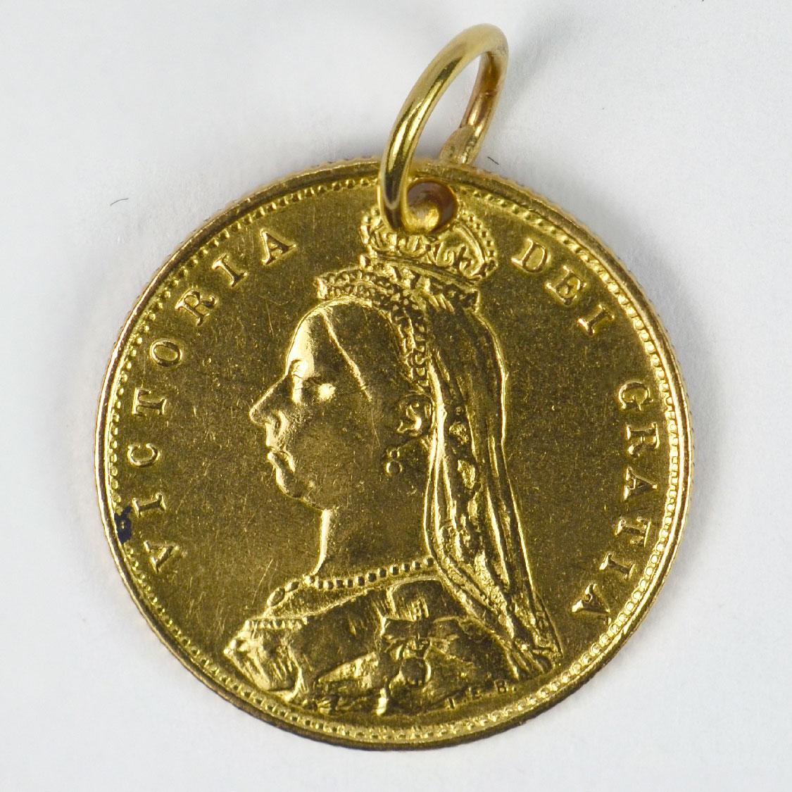 An 18 karat (18K) yellow gold charm pendant designed as a coin holder containing a 22 karat half sovereign dated 1887 produced for Queen Victoria’s Golden Jubilee featuring a portrait of the Queen by Joseph Edgar Boehm, to the reverse a shield.