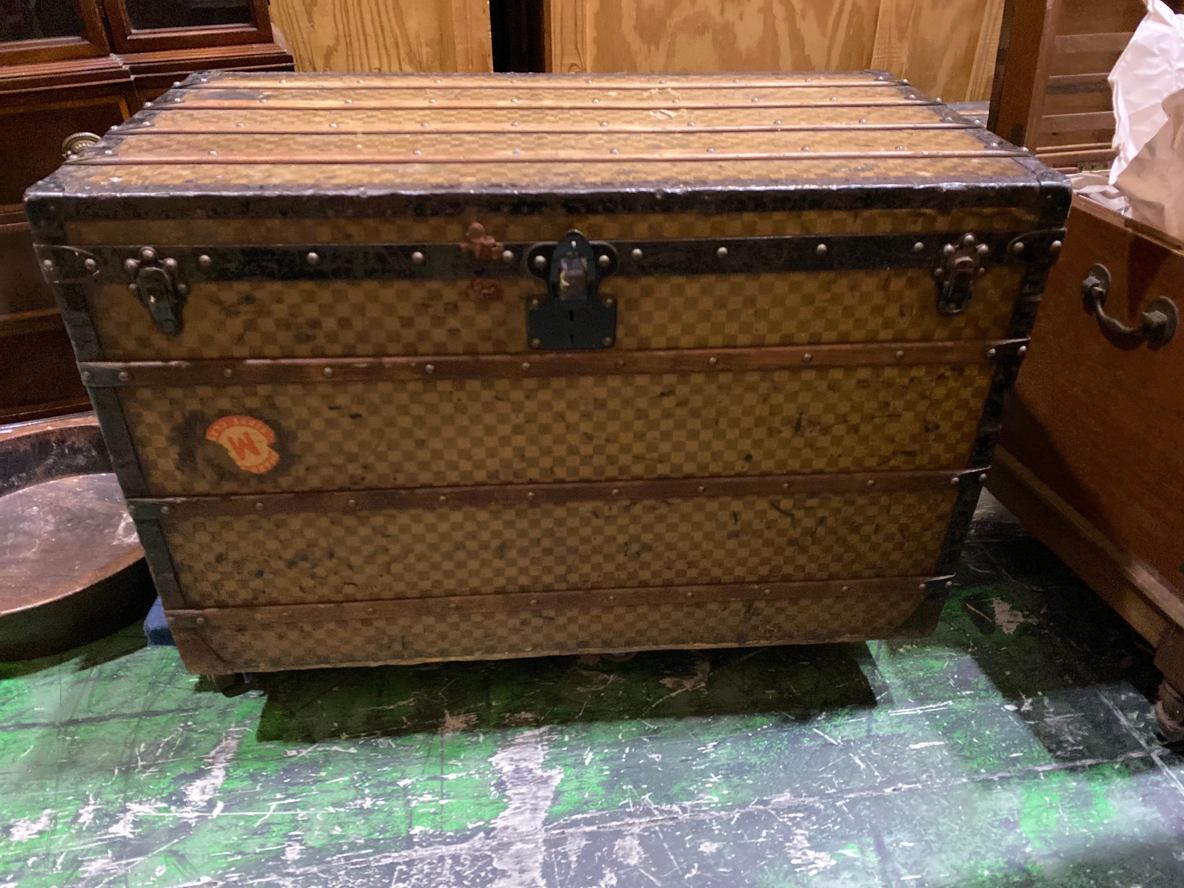 A very large-sized antique 19th century Louis Vuitton steamer trunk in the famous Damier canvas, circa 1888-1890, metal borders and reinforced wooden laths. The inside was retrofitted as a cedar chest. The entire inside is lined with cedar plus two