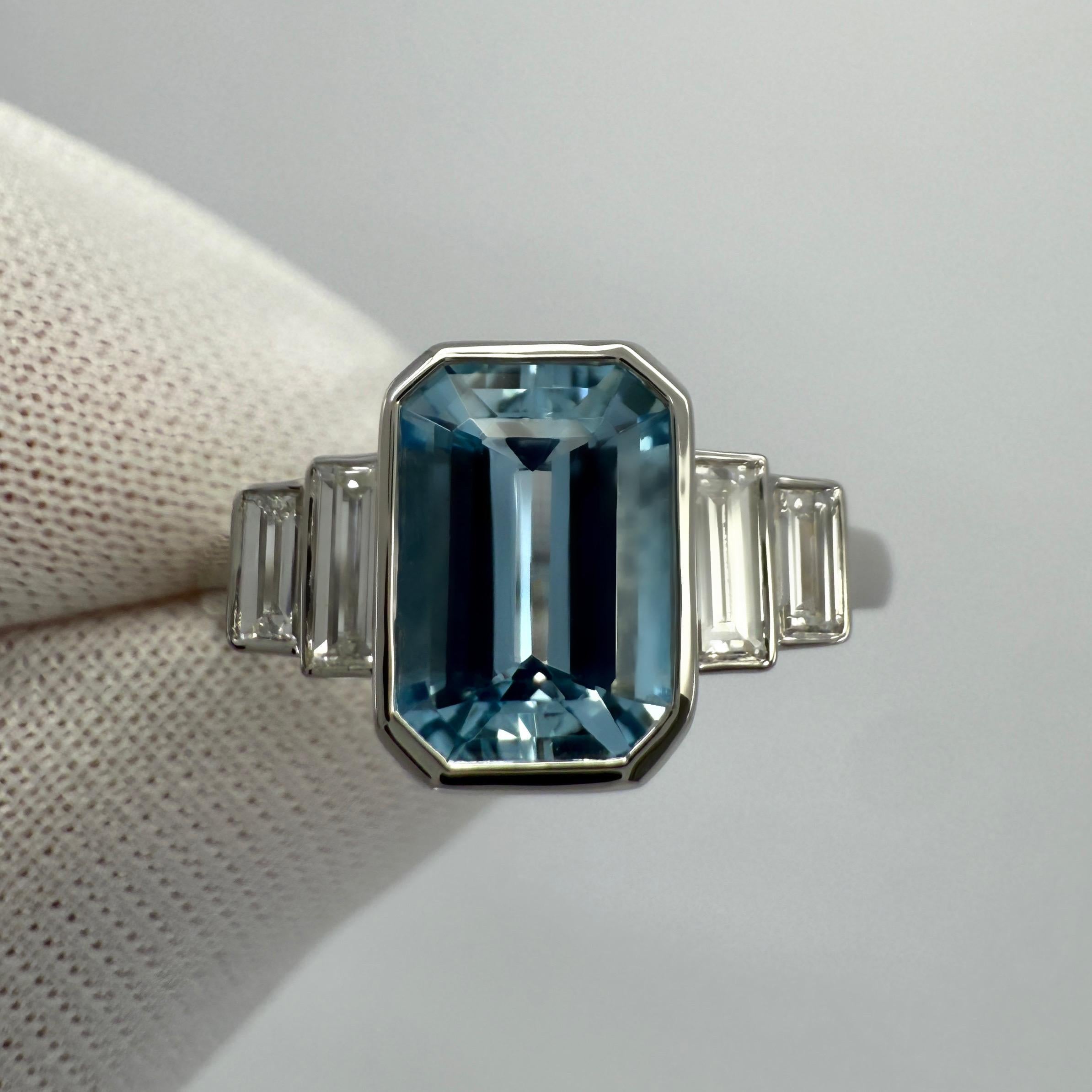 Fine Natural Vivid Blue Aquamarine And Diamond Art Deco Style Five Stone Platinum Ring. 1.88 Total carat.

Stunning platinum ring with a beautiful 1.25 carat vivid blue aquamarine.
A fine colour stone with excellent clarity and a superb emerald cut.