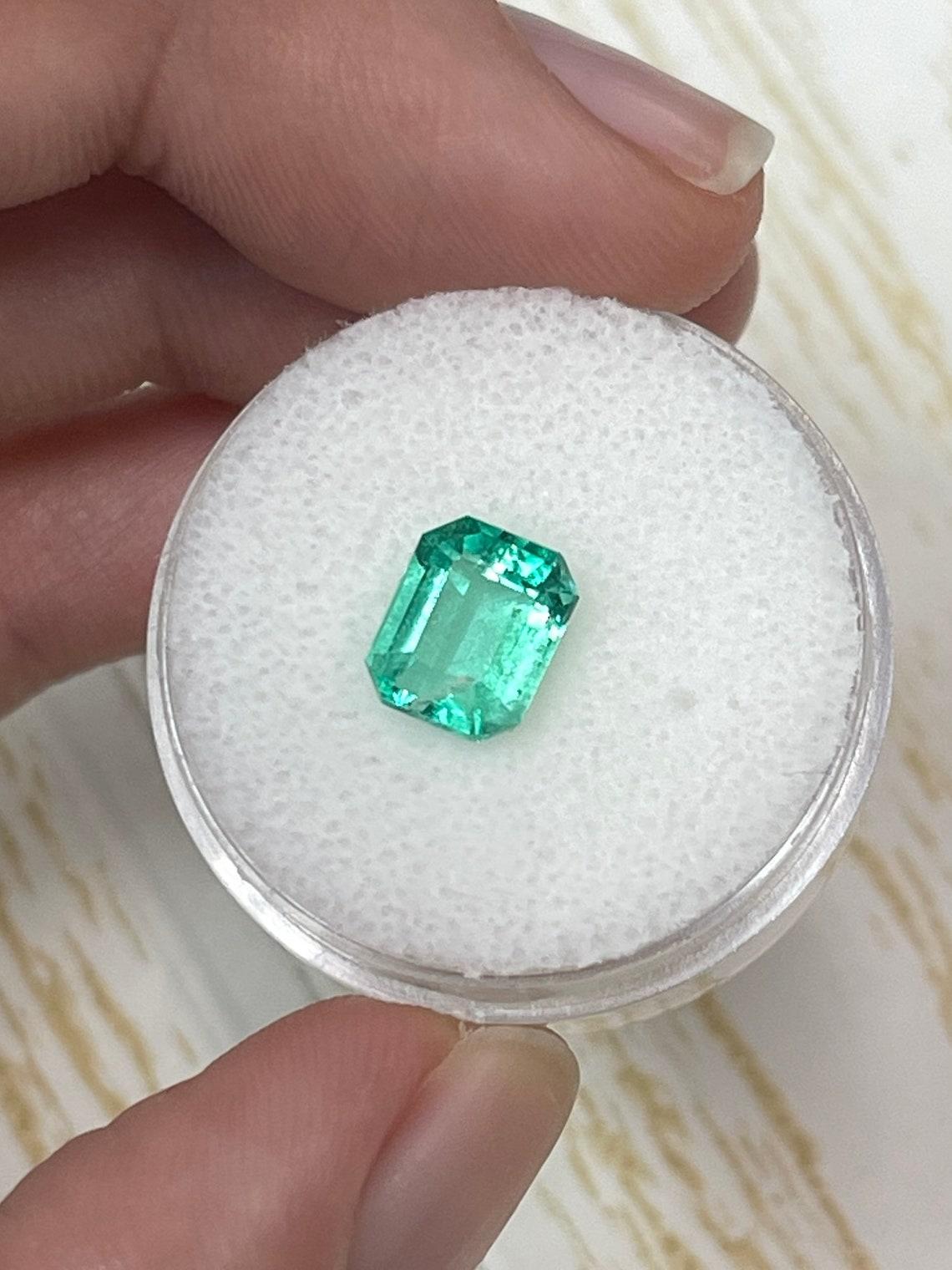 Women's 1.89 Carat 8.3x6.8 Medium Green Colombian Emerald - Emerald Cut May Birthstone For Sale