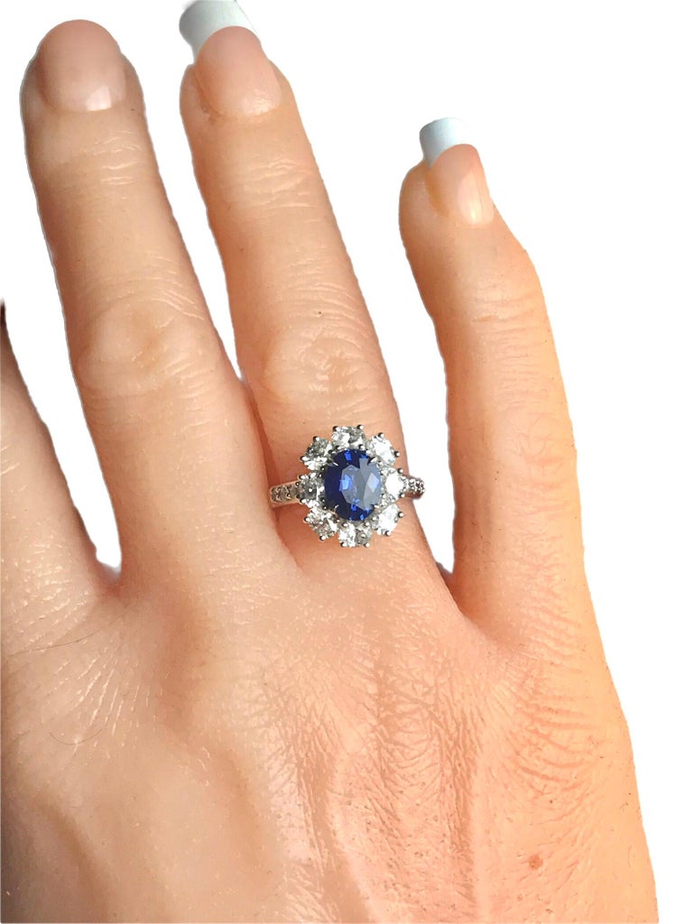1.89 Carat Oval Cut Ceylon Sapphire Ring with 1.53 Carat Diamond Halo in 18k In New Condition For Sale In New York, NY