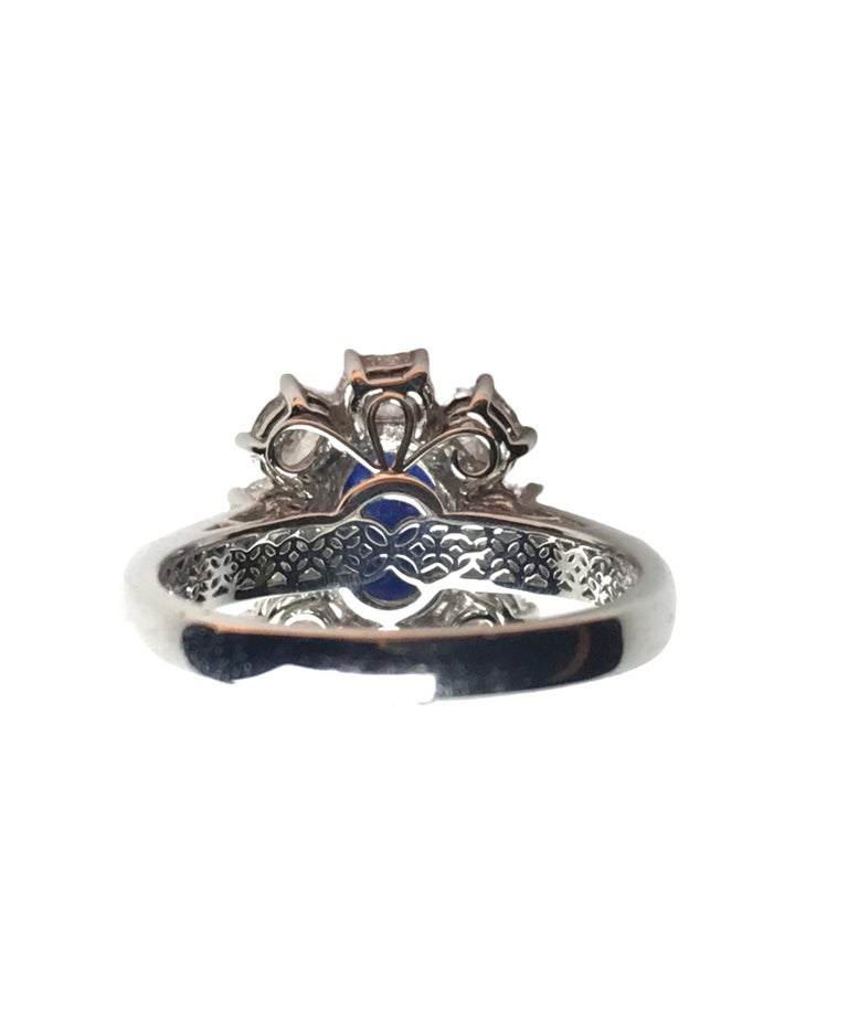 1.89 Carat Oval Cut Ceylon Sapphire Ring with 1.53 Carat Diamond Halo in 18k For Sale 2
