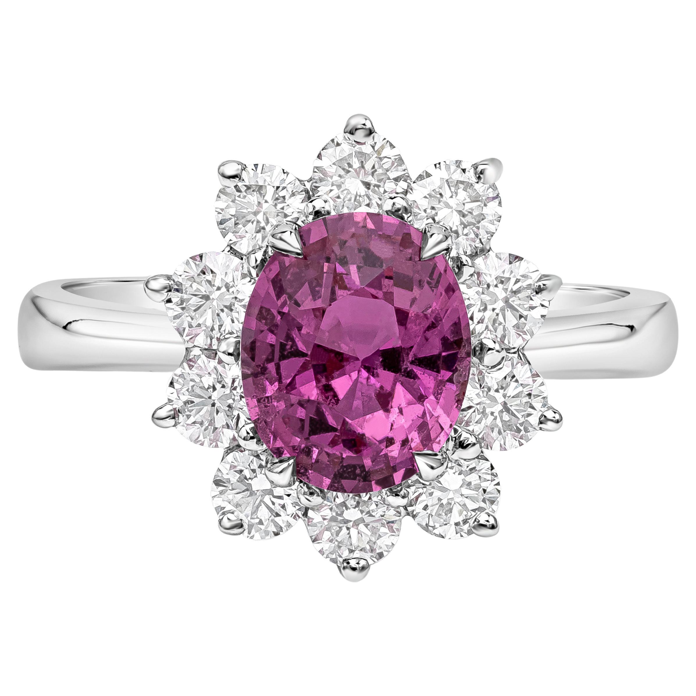1.89 Carat Oval Cut Pink Sapphire and Diamond Halo Engagement Ring