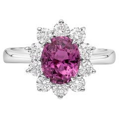 1.89 Carat Oval Cut Pink Sapphire and Diamond Halo Engagement Ring