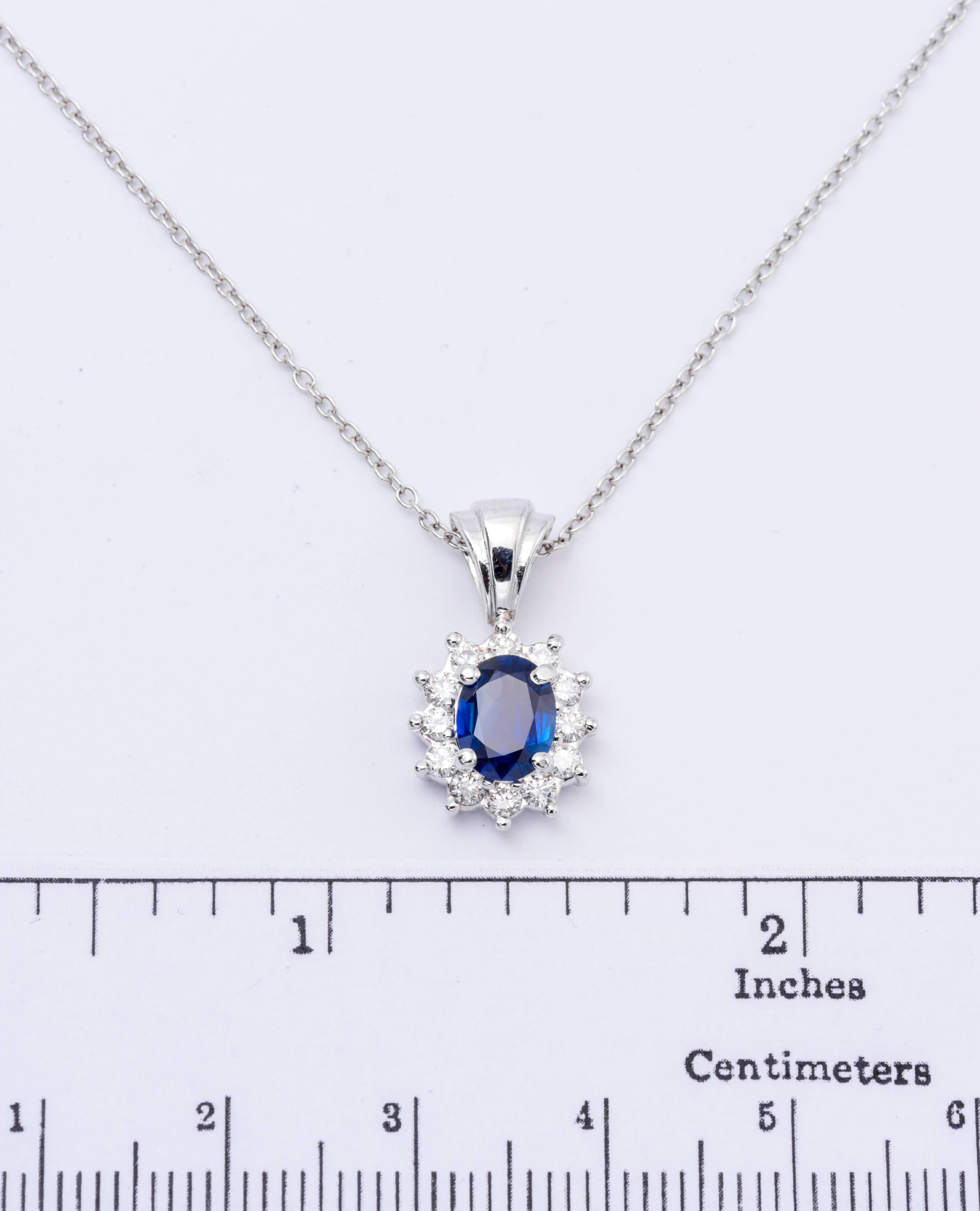 Contemporary 1.89 Carat Oval Sapphire Diamond Halo Pendant