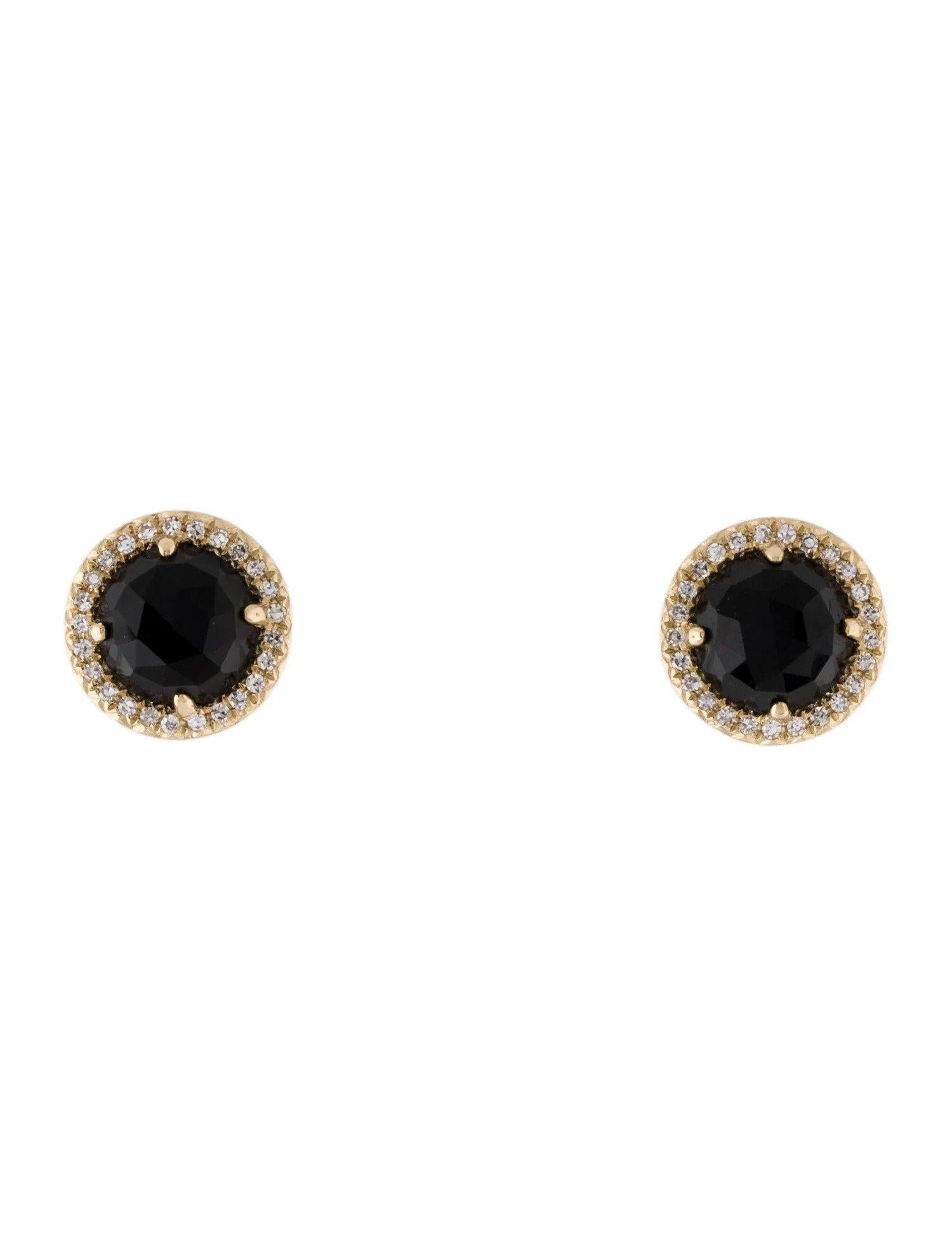 These Black Onyx & Diamond Earrings are a stunning and timeless accessory that can add a touch of glamour and sophistication to any outfit. 

These earrings each feature a 0.94 Carat Round Black Onyx, with a Diamond Halo comprised of 0.06 Carats of